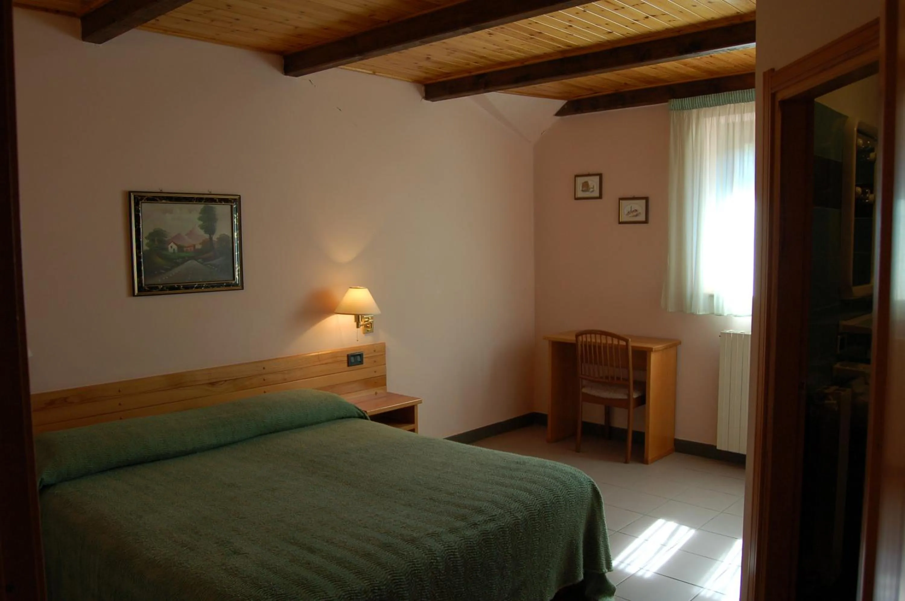 Bed in hotel lo sciatore