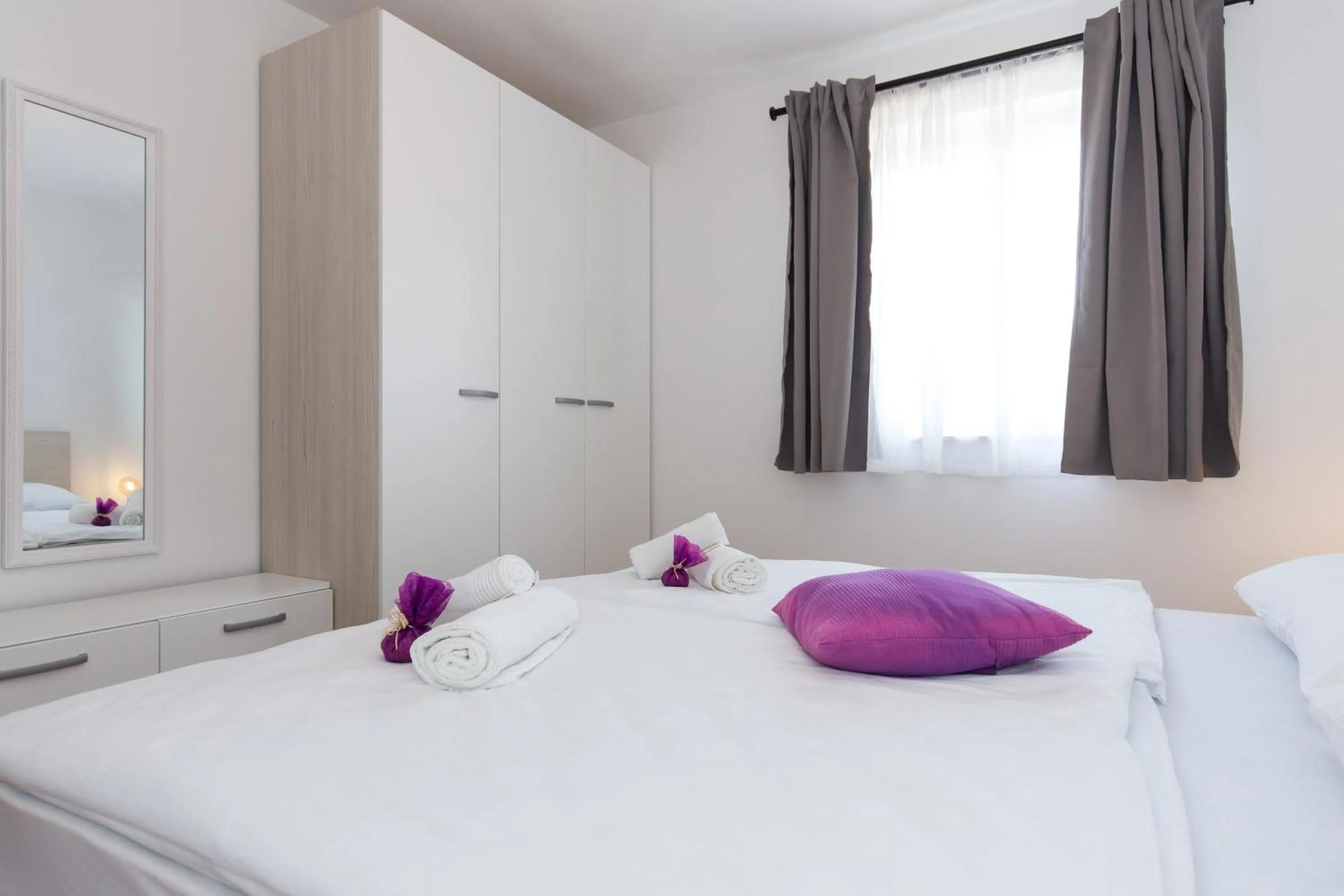 Bed in Apartments Kiara Punat