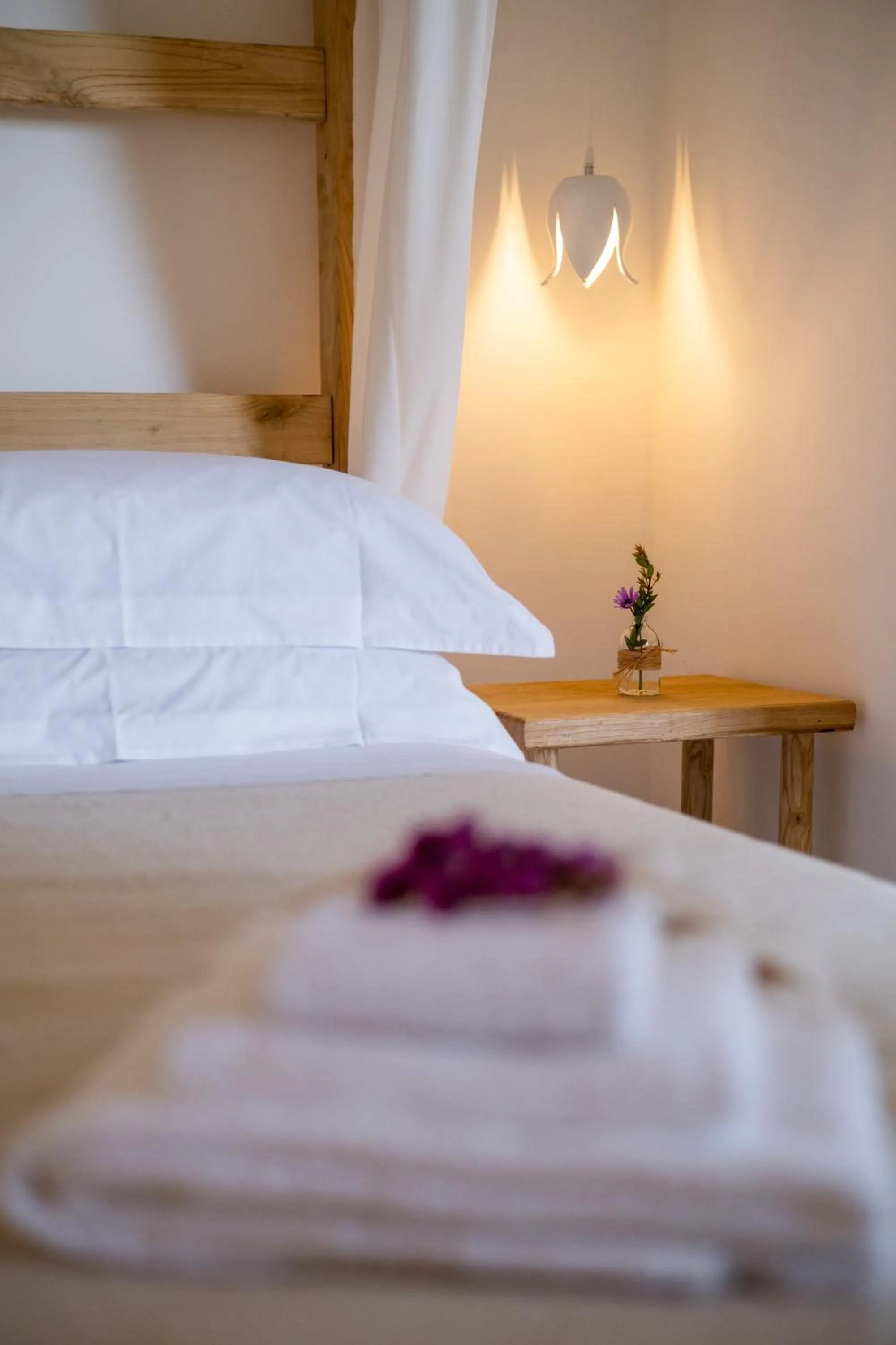 Decorative detail, Bed in Masseria Rauccio