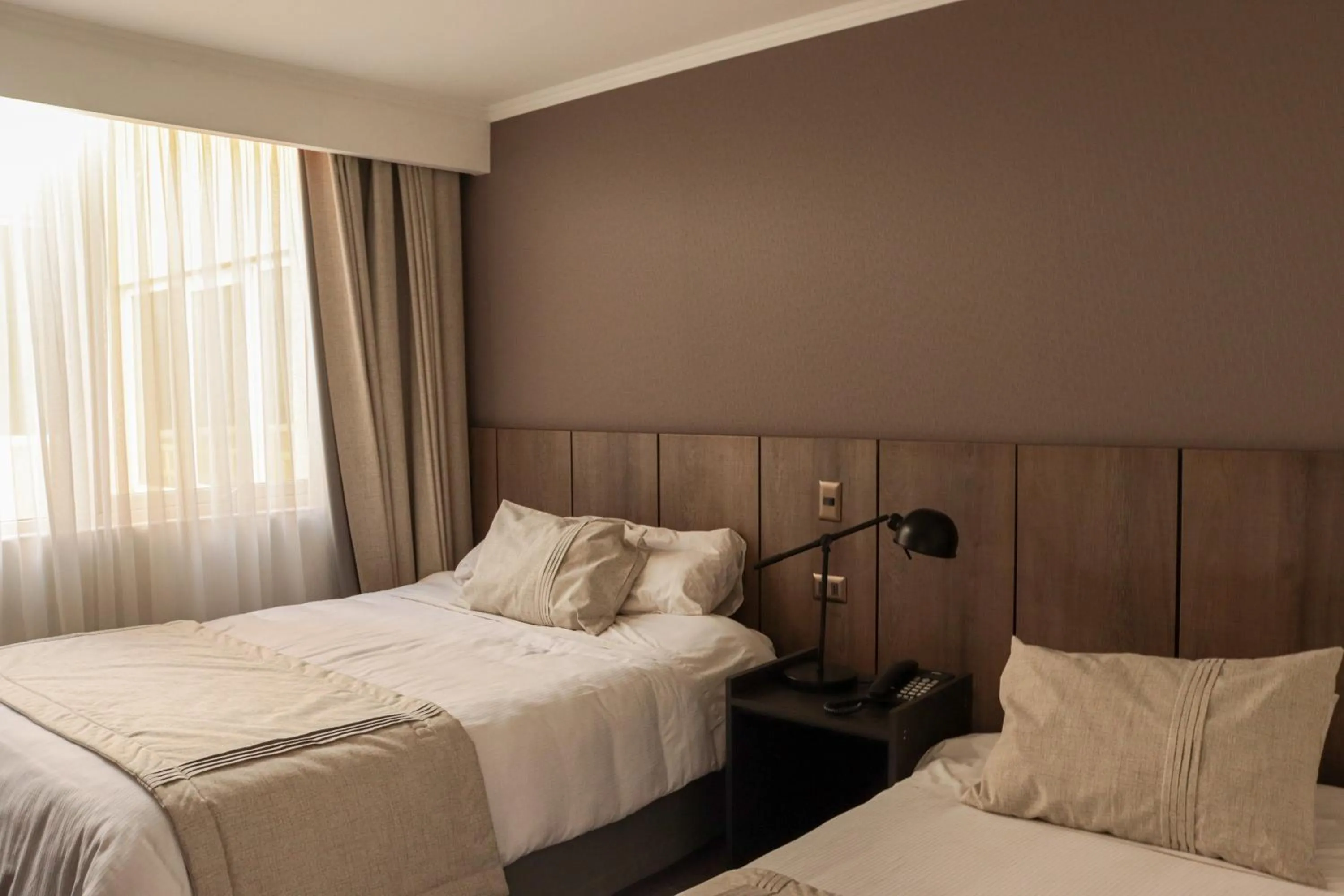 Photo of the whole room, Bed in Hotel Terrano Concepción