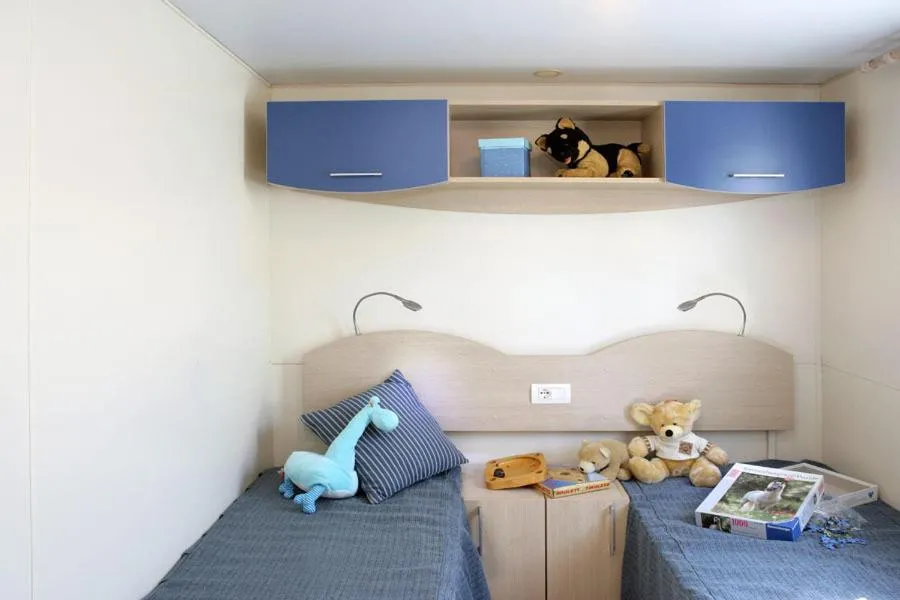 Decorative detail, Bed in New Camping Le Tamerici