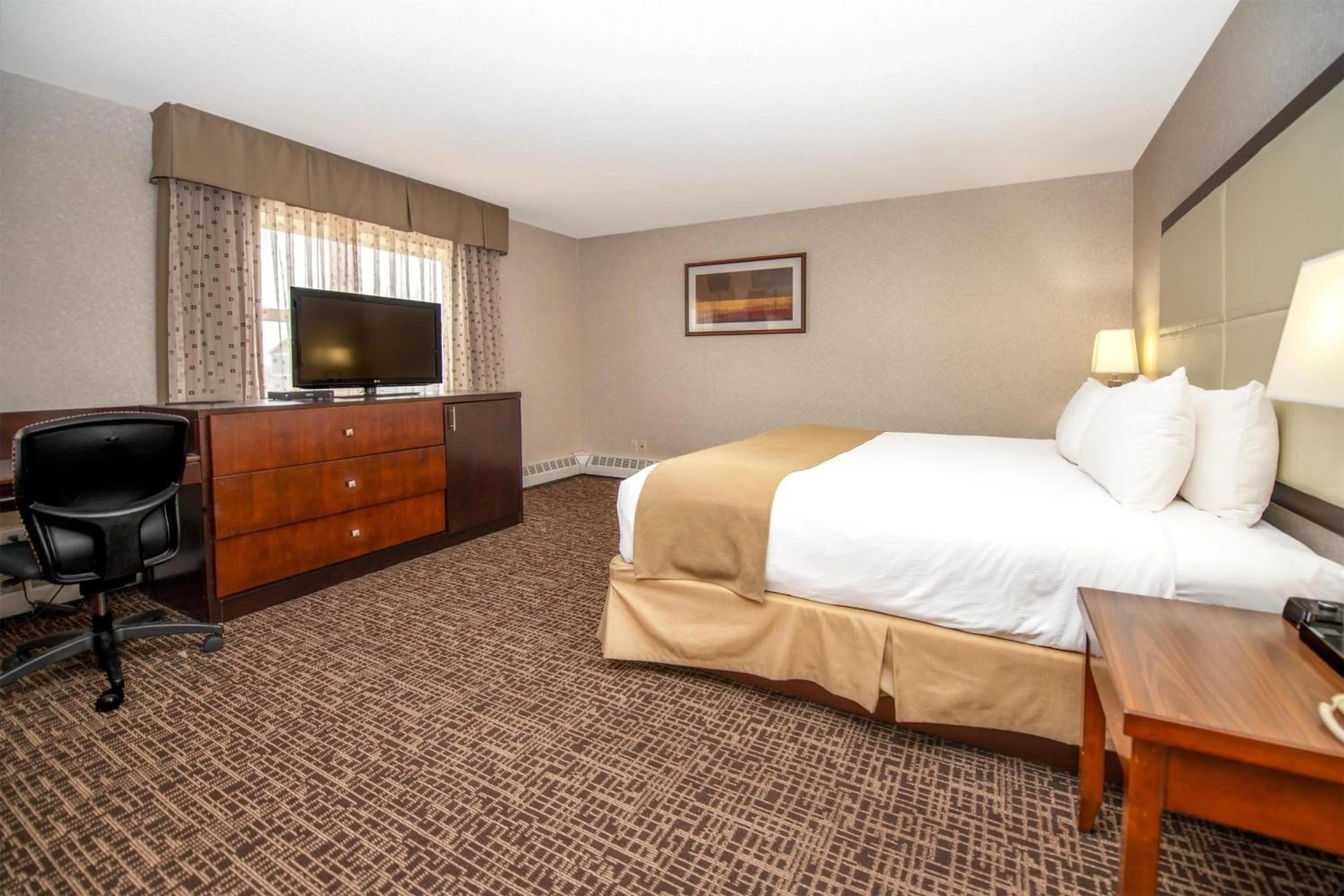 Photo of the whole room, Bed in Coast Fort St John Hotel