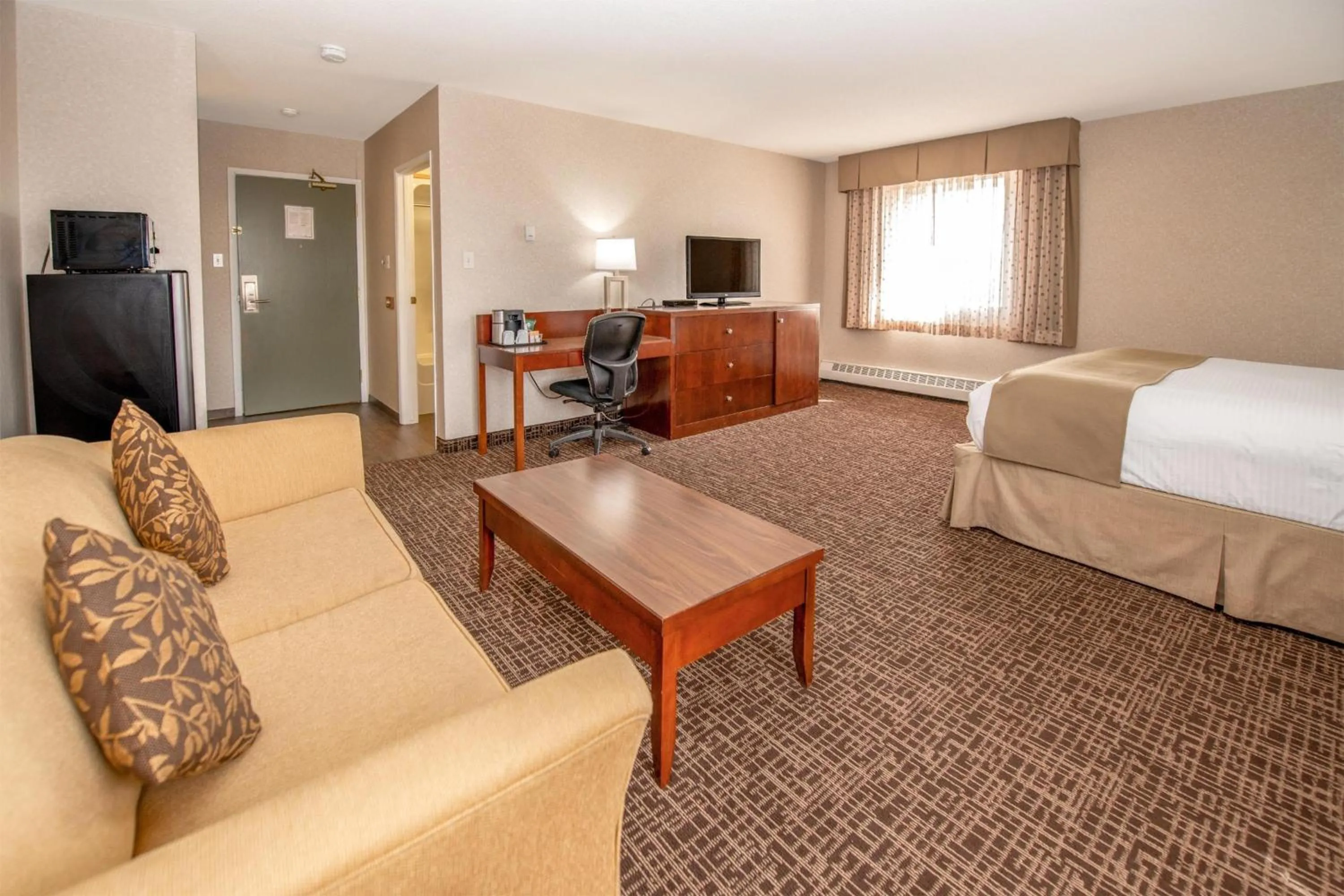 Photo of the whole room, Bed in Coast Fort St John Hotel