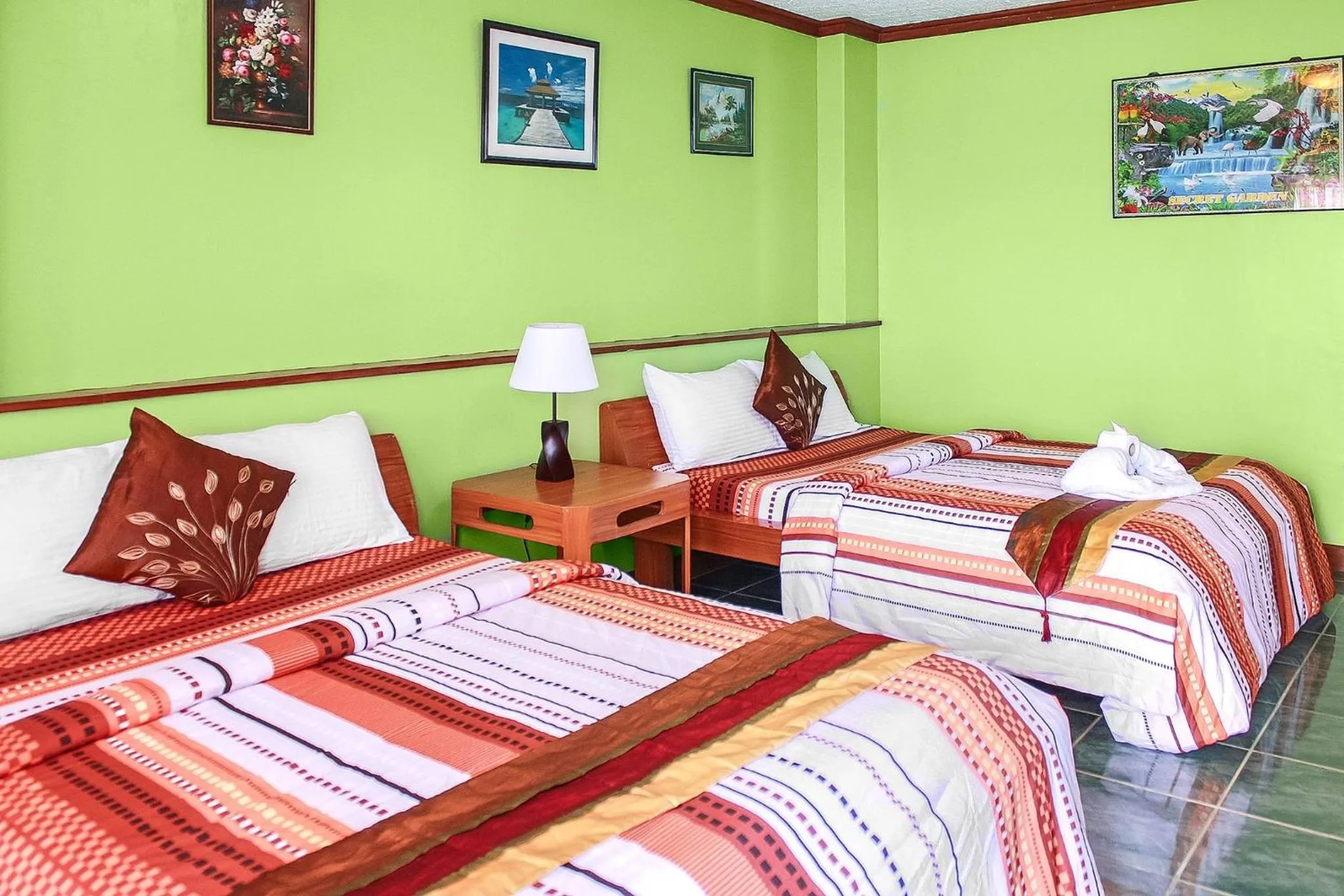 Bed in Blue Corals Beach Resort