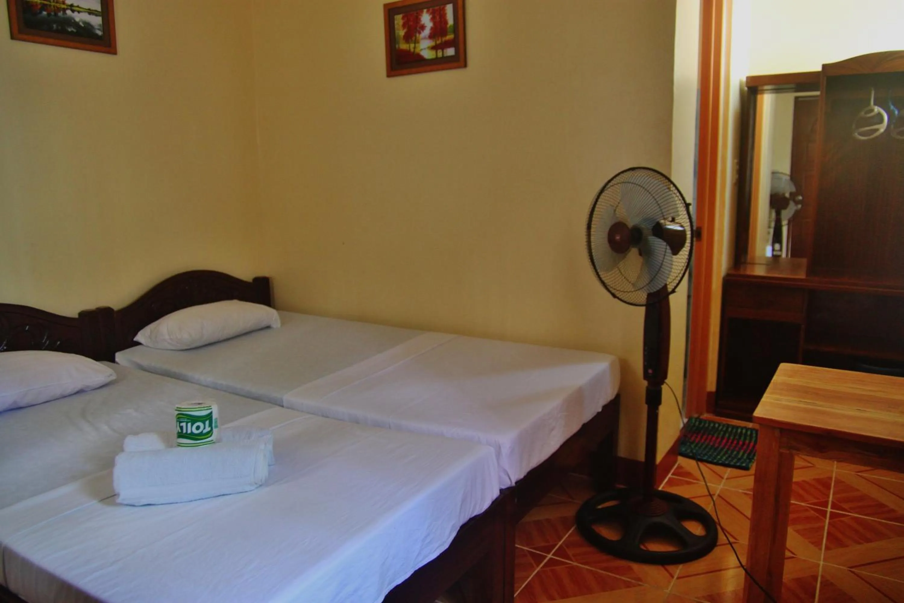 Photo of the whole room, Bed in Blue Corals Beach Resort