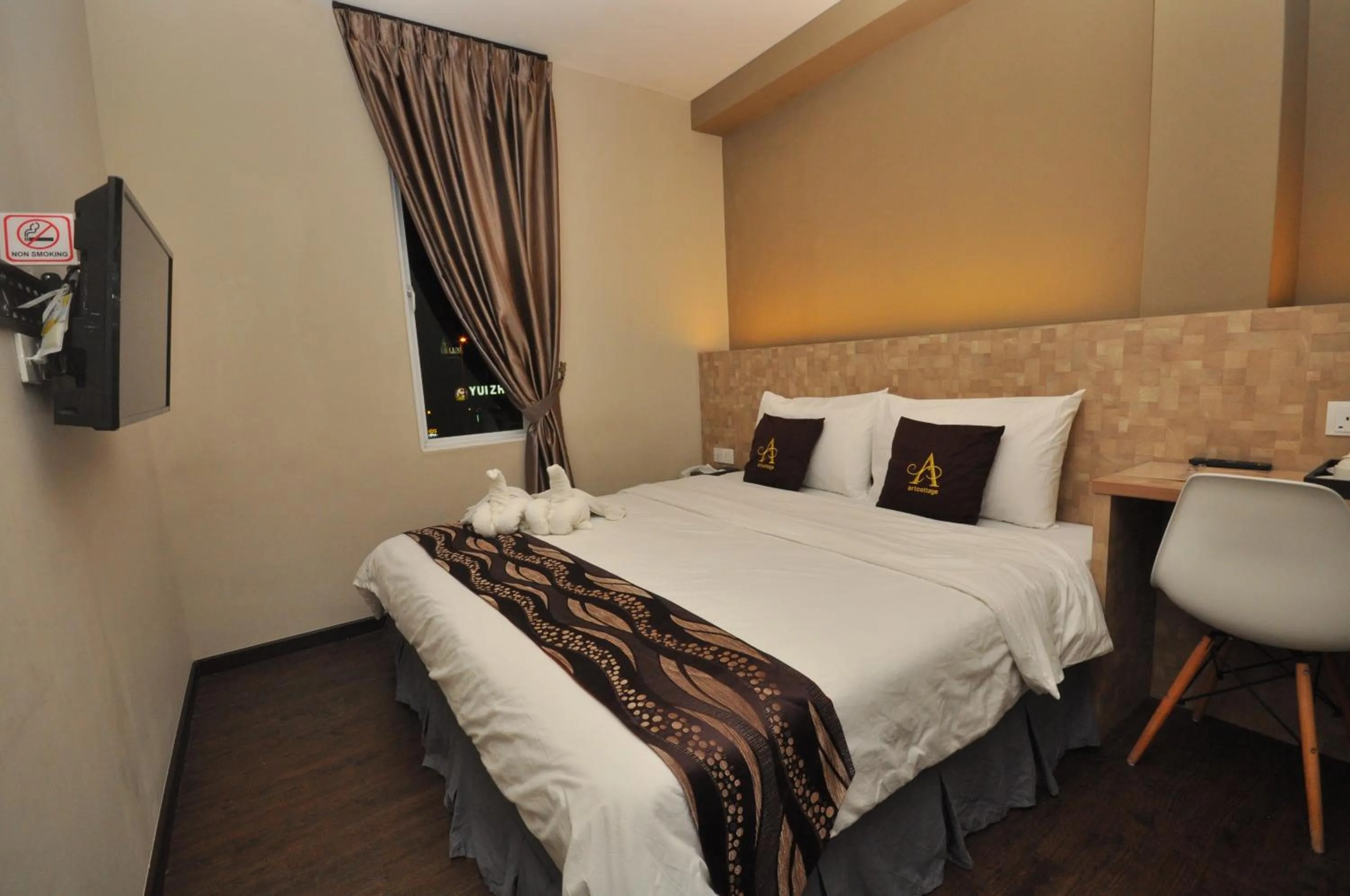 Bed in Art Cottage Hotel