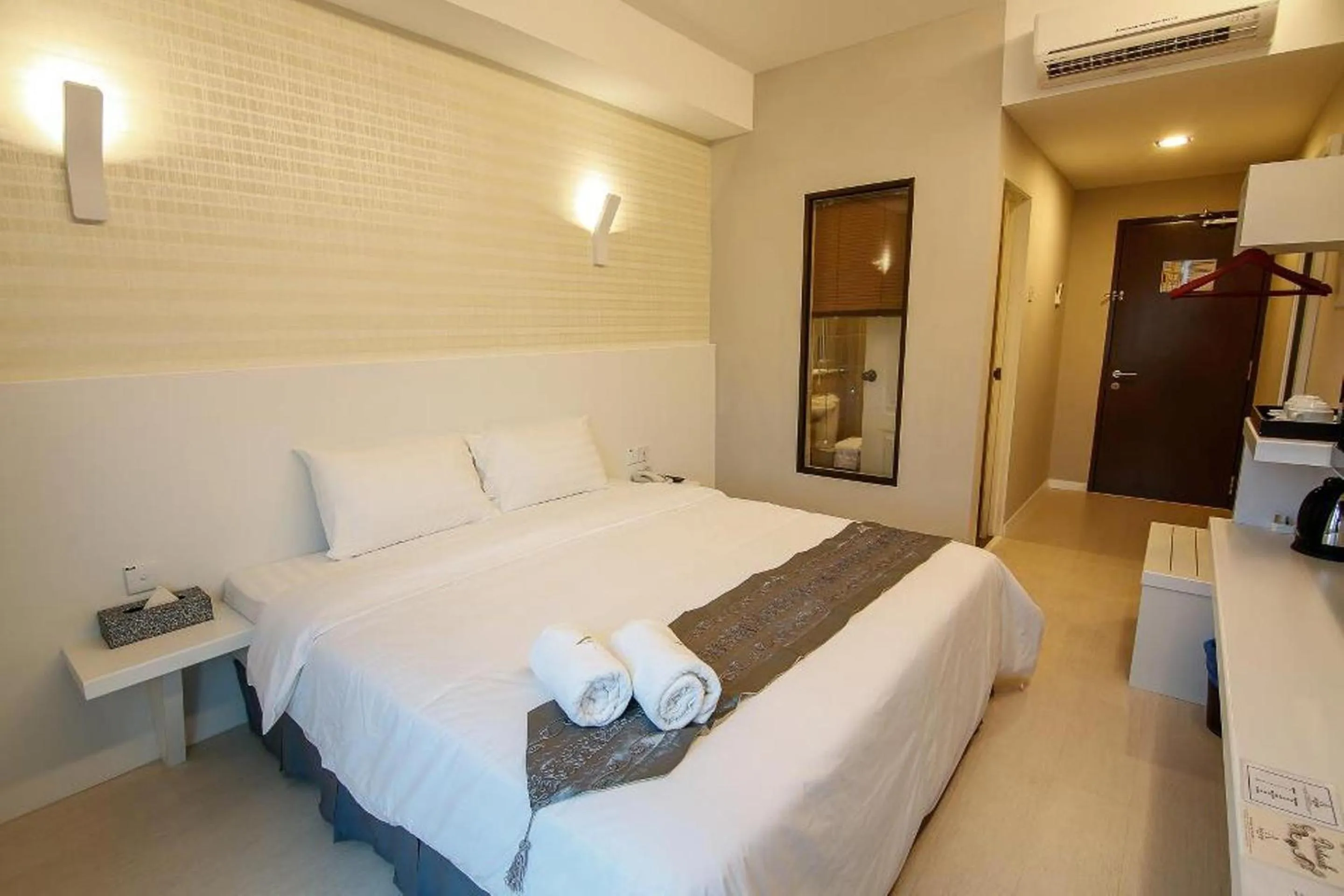 Bed in Art Cottage Hotel