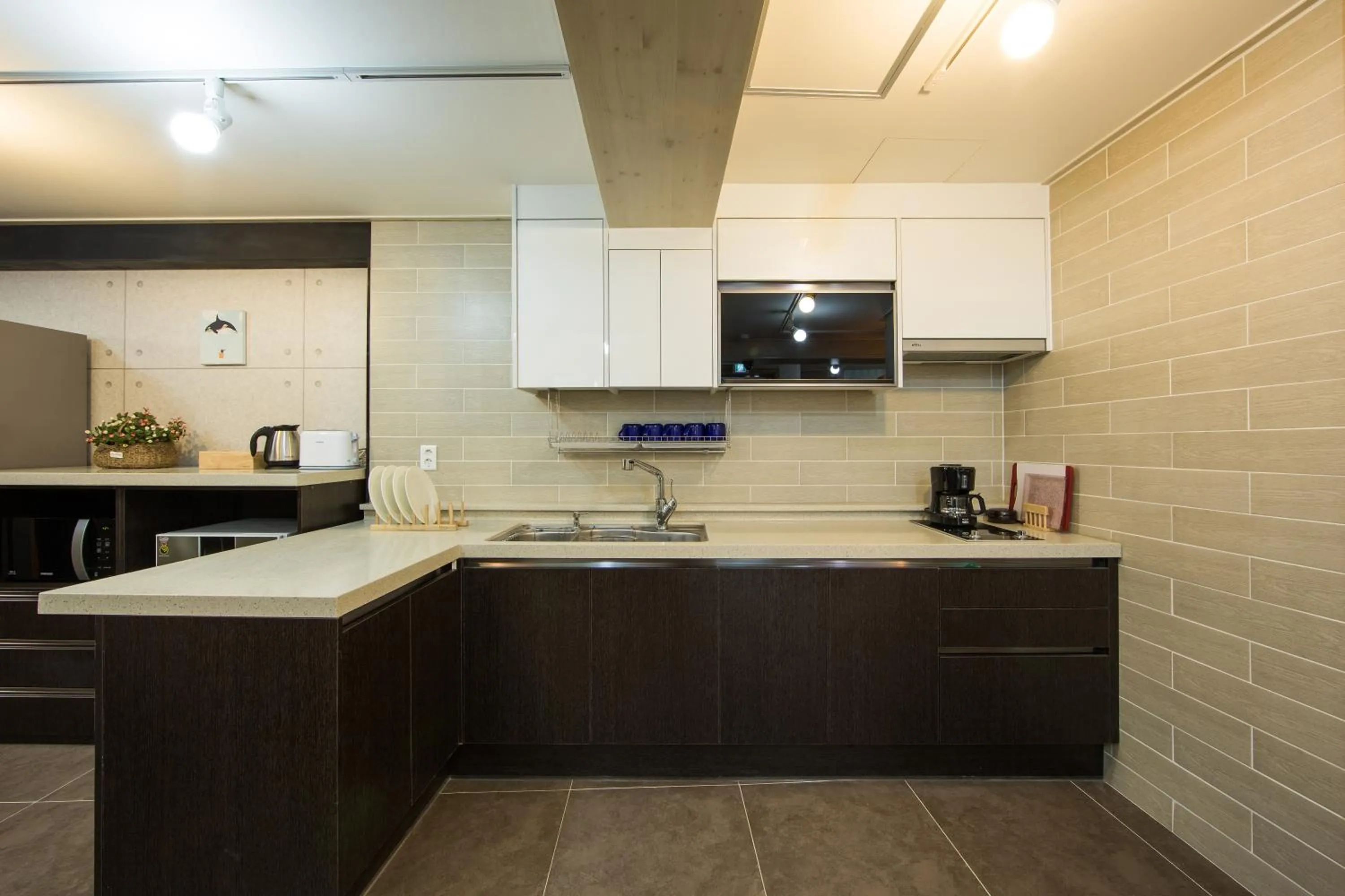 Communal lounge/ TV room in Guesthouse The Hill