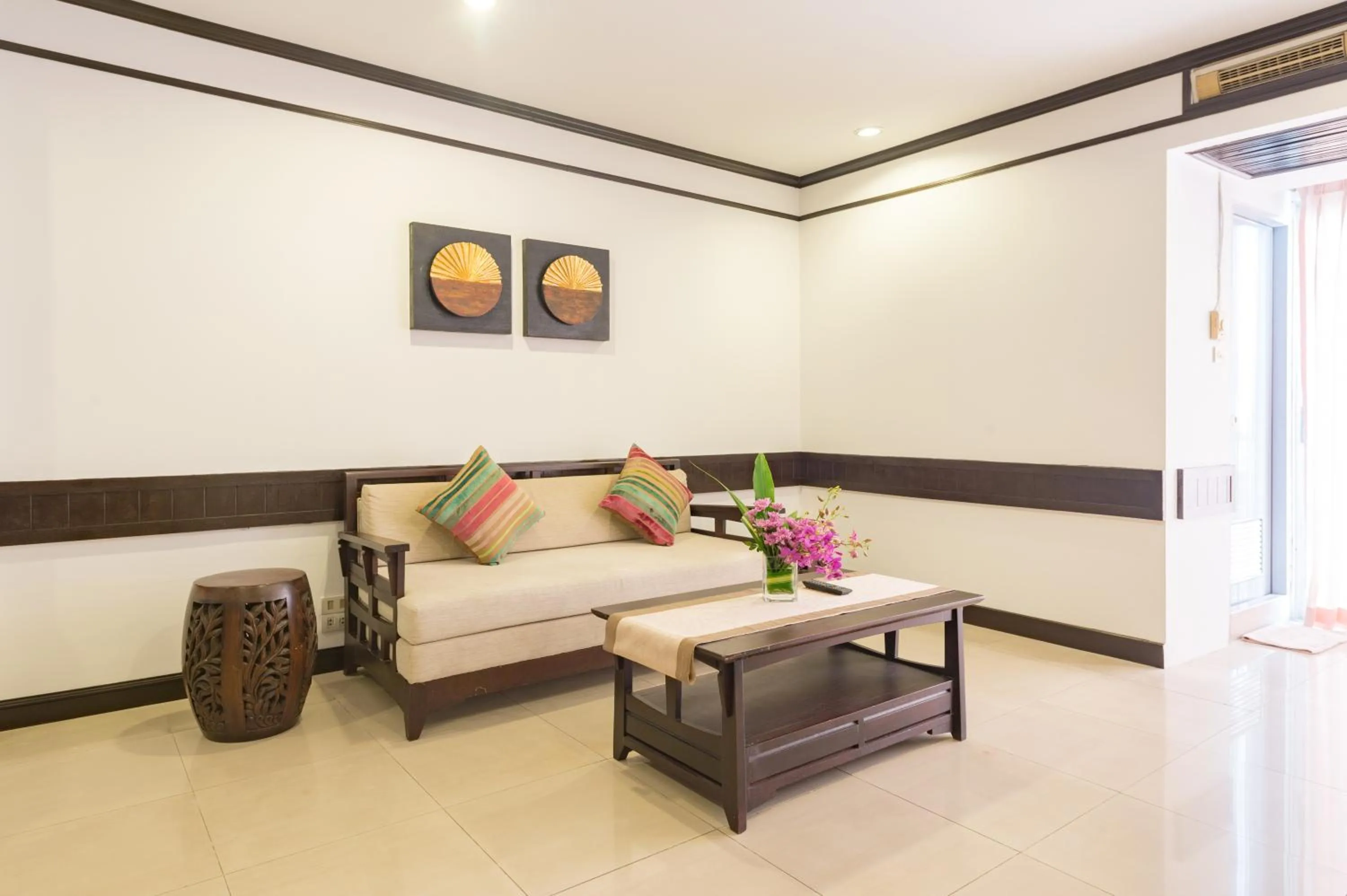 Seating area, Bed in The Legacy Convention Hotel