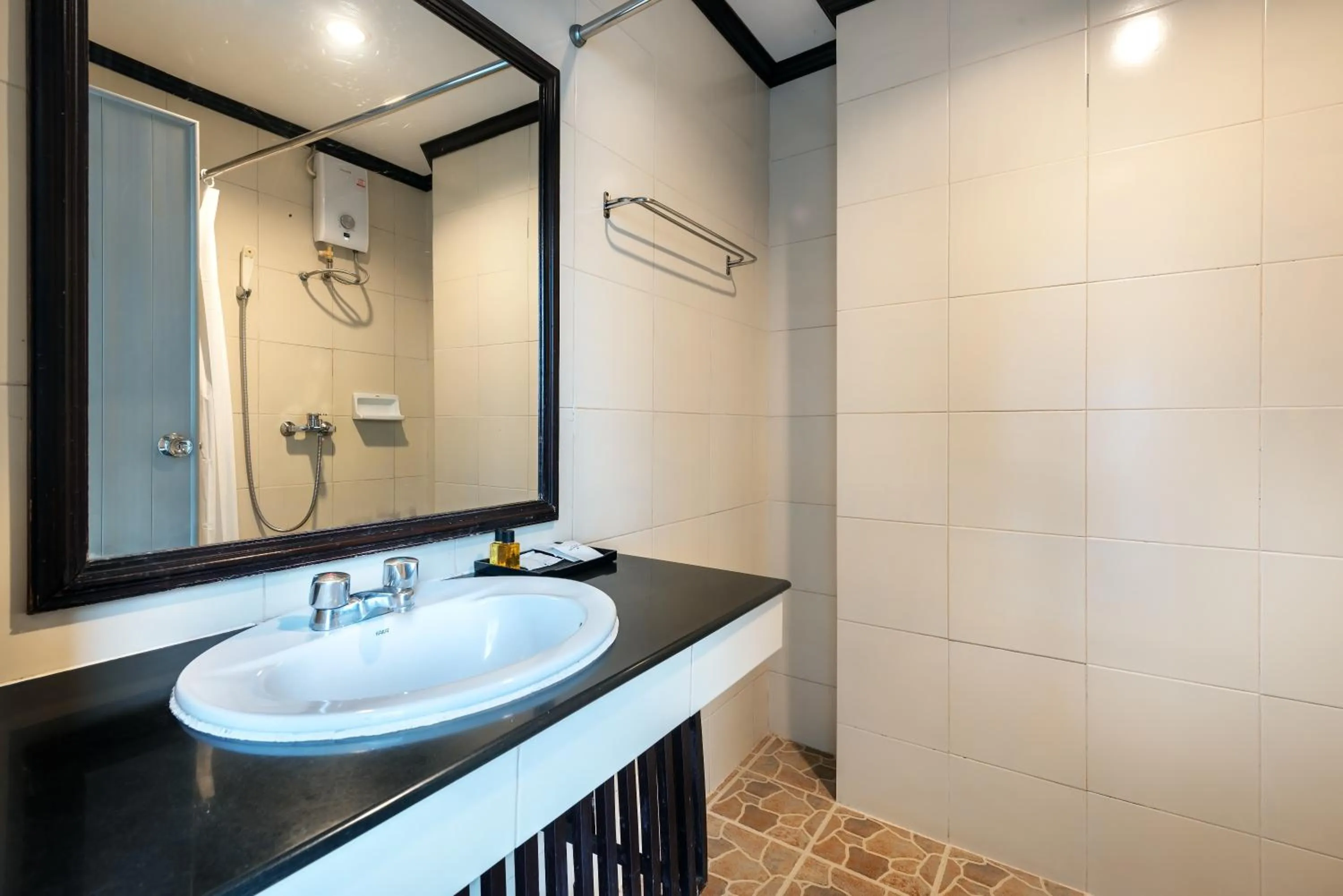 Shower in The Legacy Convention Hotel