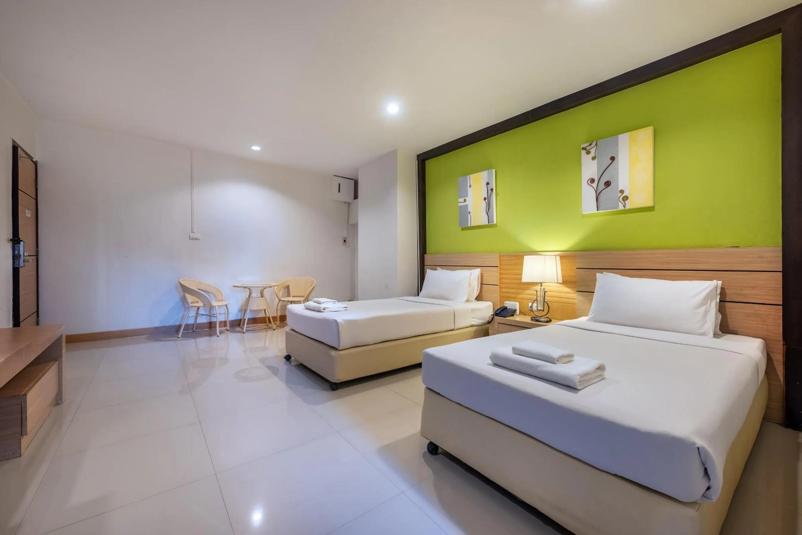 Bed in The Legacy Convention Hotel