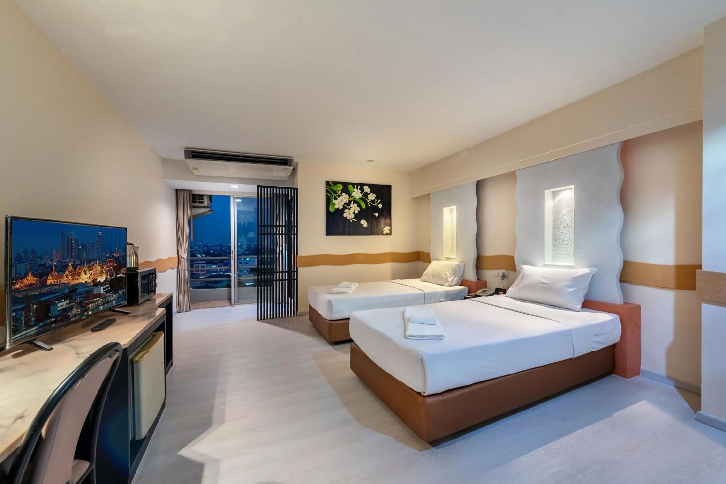 Bed in The Legacy Convention Hotel