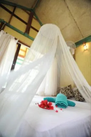 Bed in Smile Bungalow Bottle Beach