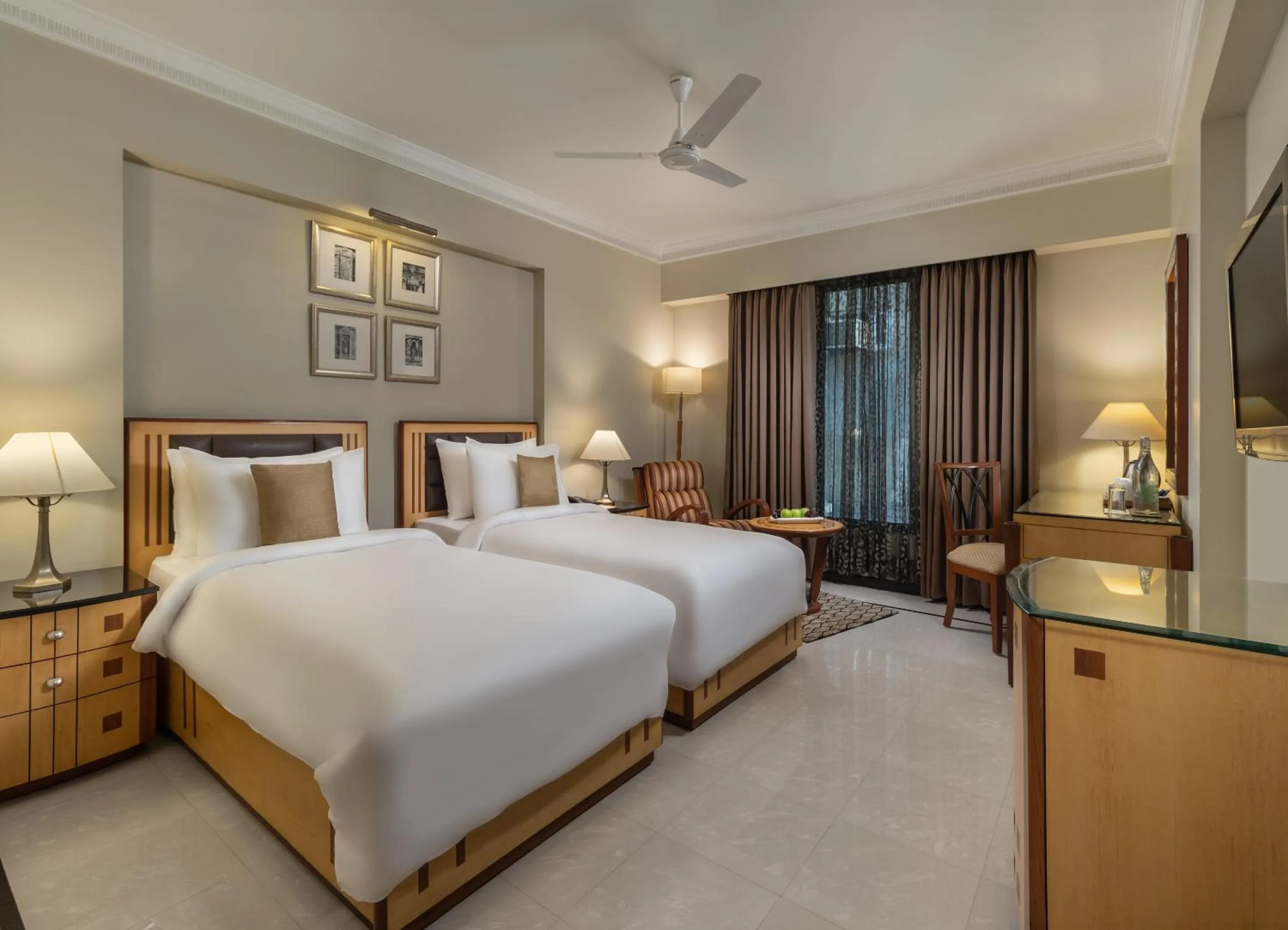 Photo of the whole room, Bed in Sarovar Portico Kalupur Ahmedabad