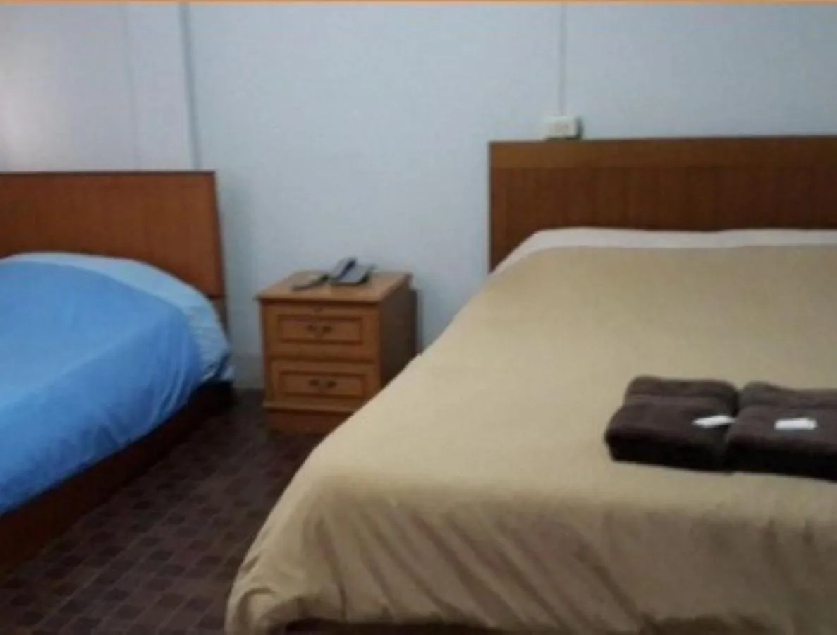 Bed in White Orchid Inn I