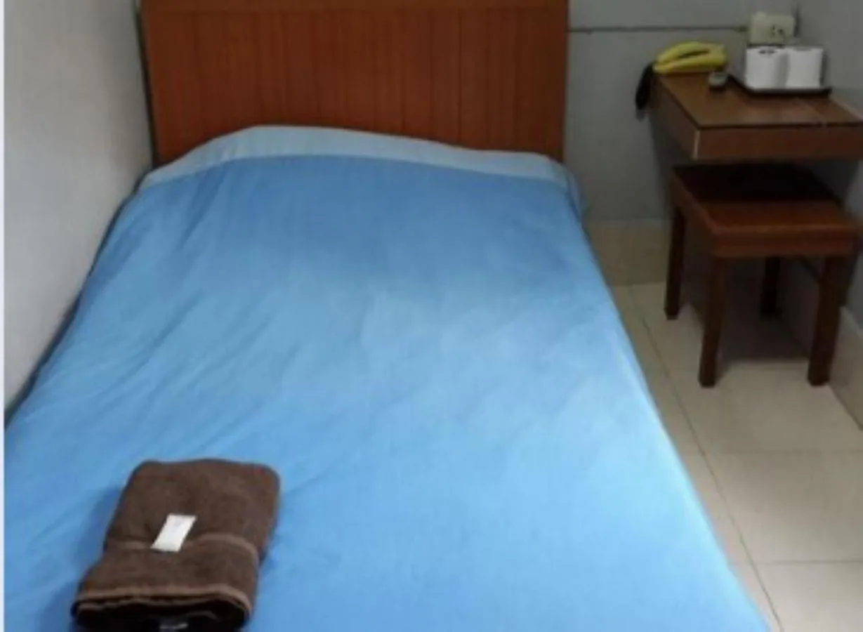 Bedroom, Bed in White Orchid Inn I