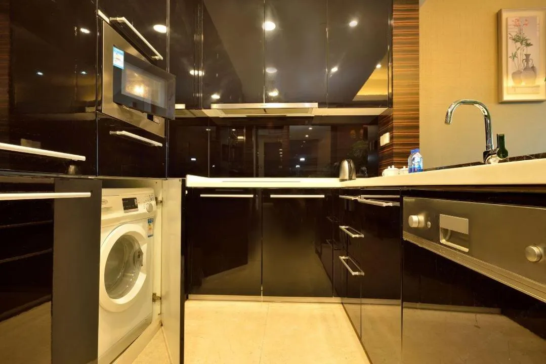 Kitchen or kitchenette in HeeFun Apartment GZ -Poly World Trading Center-walking distance to Canton Fair