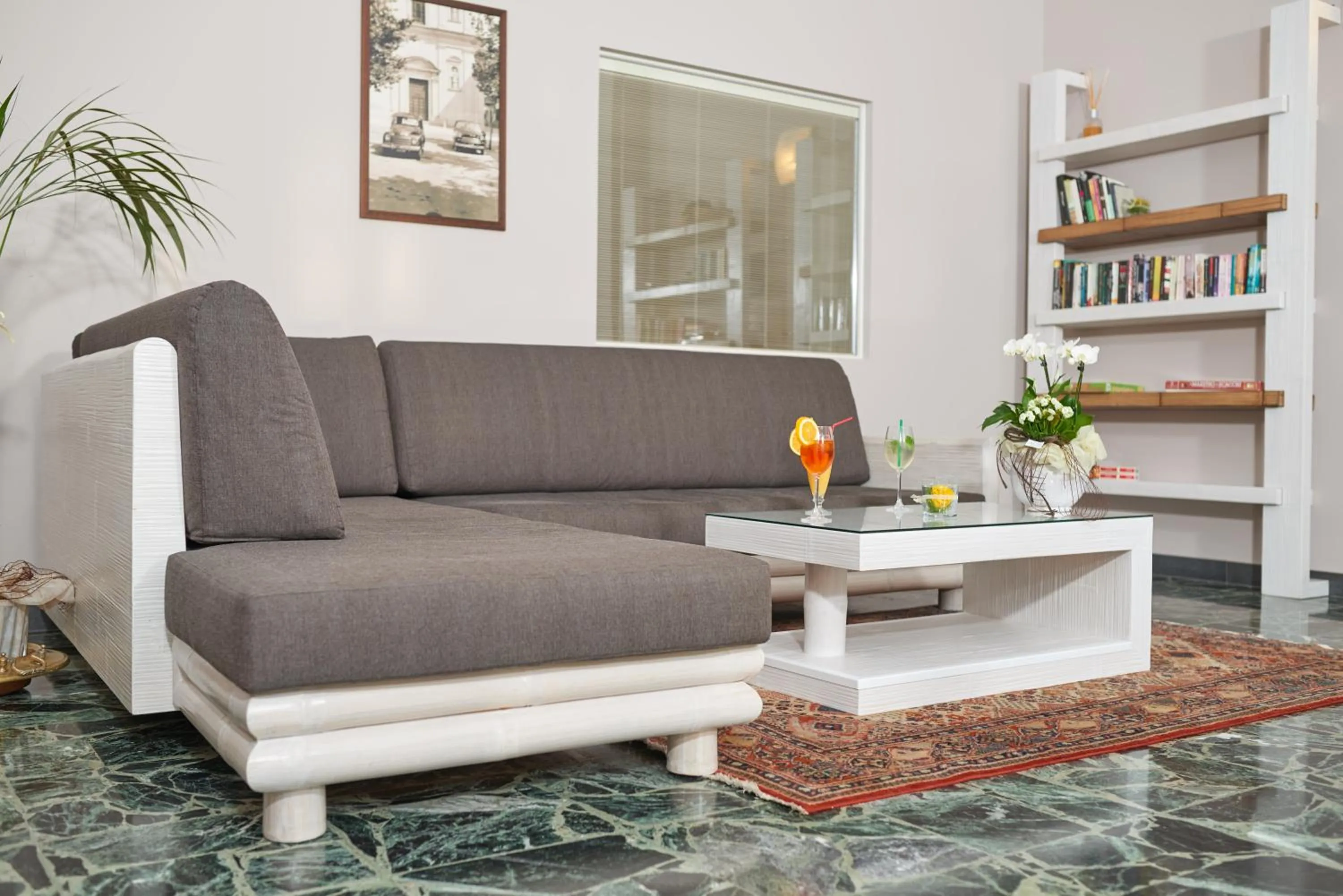 Communal lounge/ TV room in Hotel Benacus Torri del Benaco