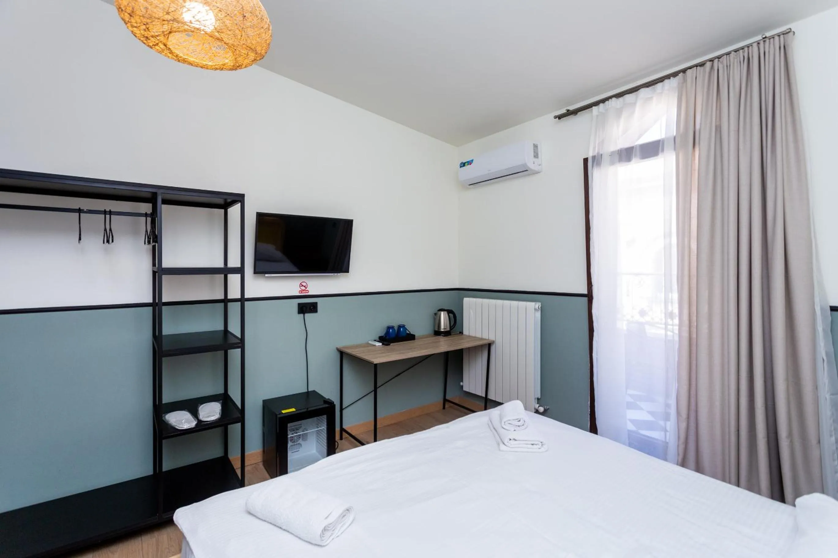 Bed in Shota Rustaveli Aparthotel