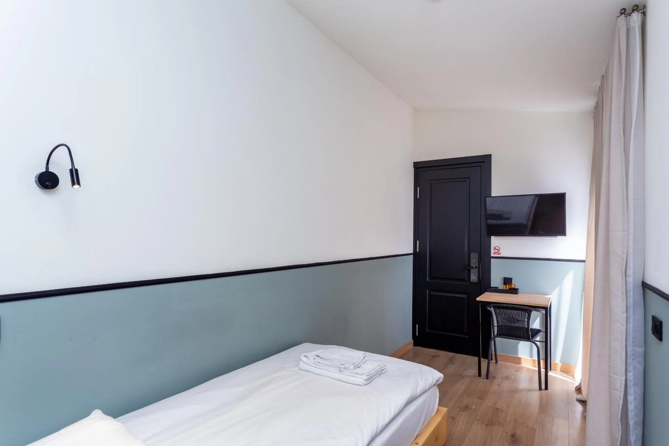 Bed in Shota Rustaveli Aparthotel