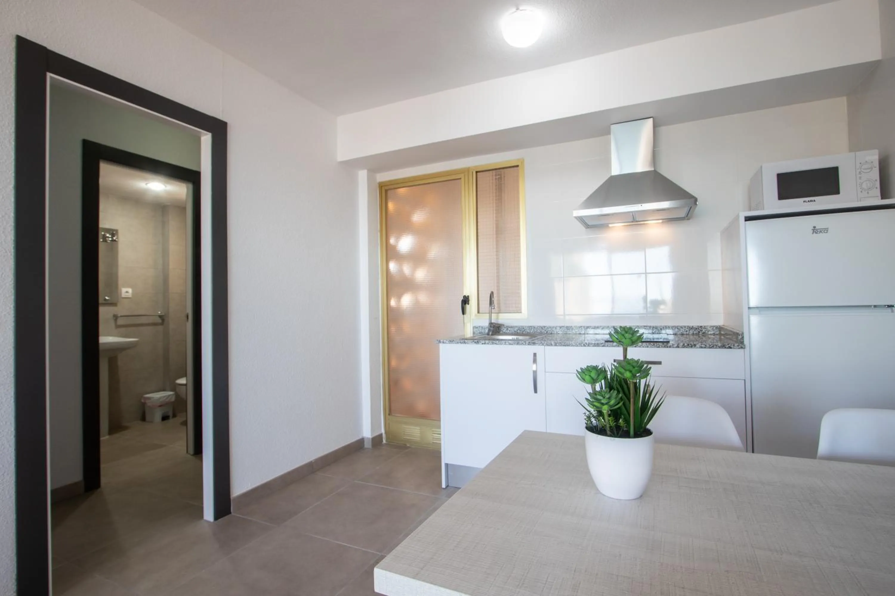 Kitchen or kitchenette in Trebol One Apartments By Mc