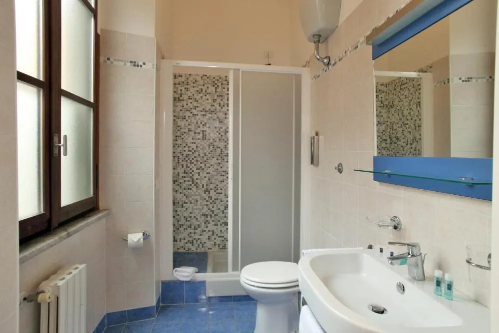 Toilet in Hearth Hotel