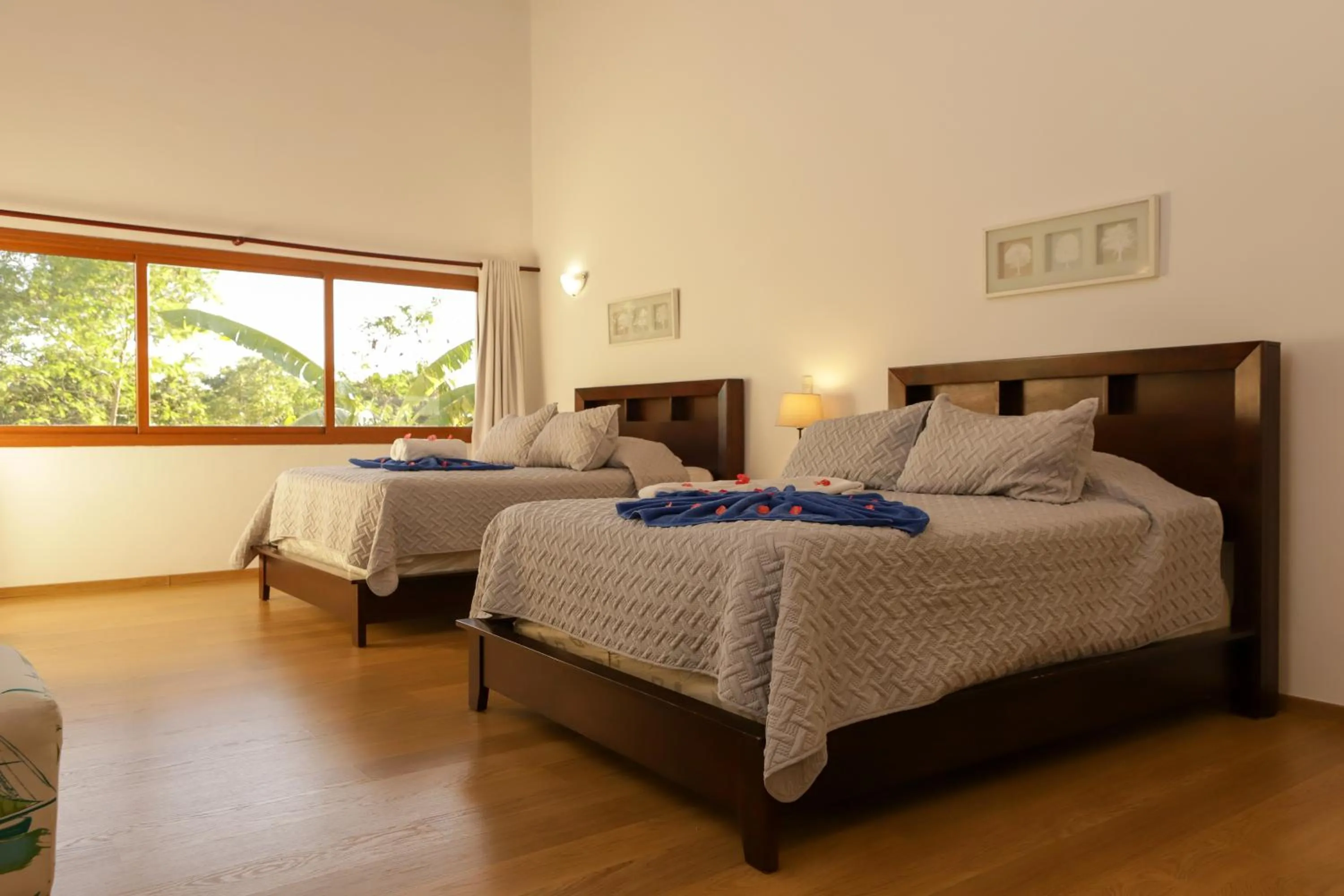 Bed in Sybaris Suites & Residences