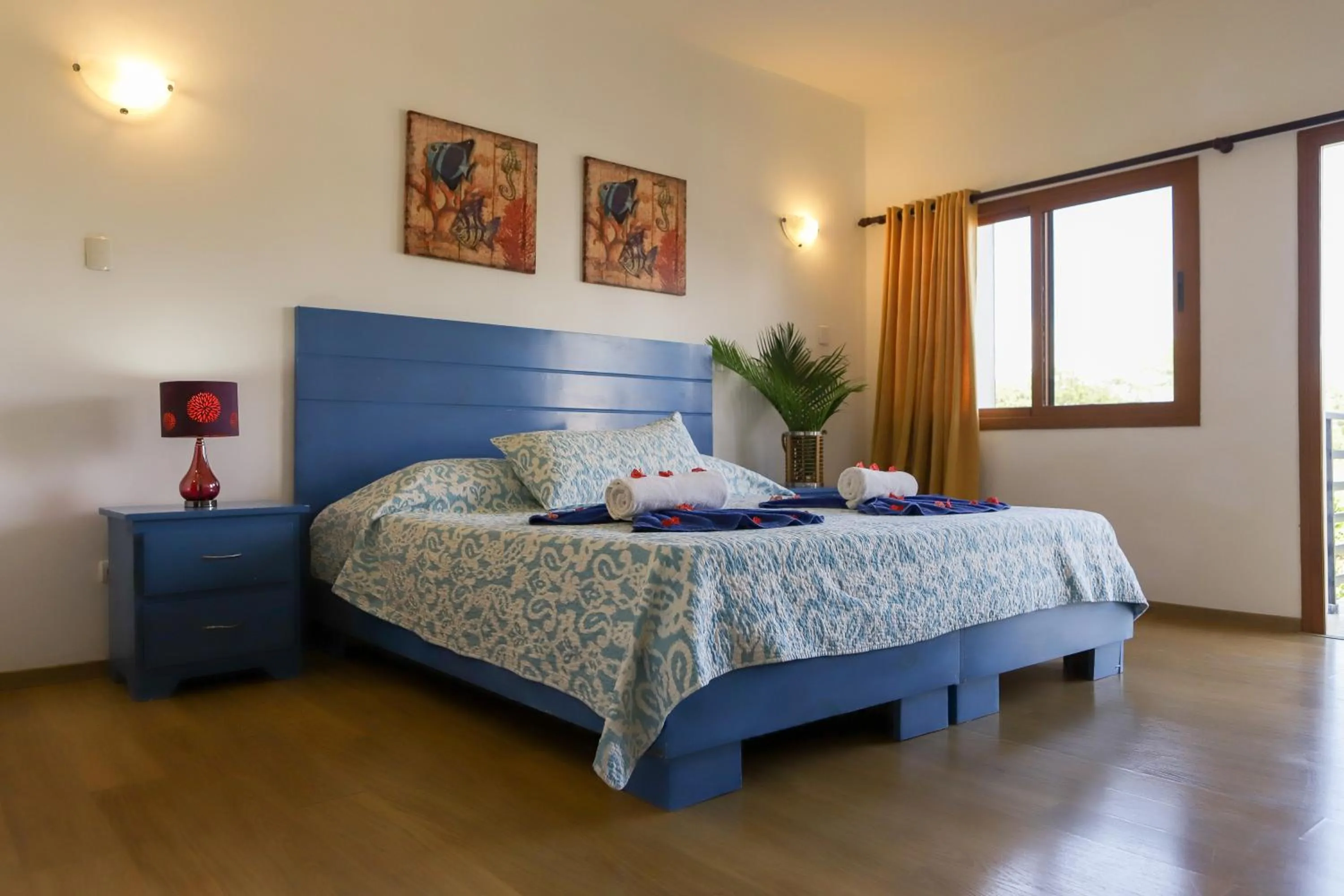Bed in Sybaris Suites & Residences