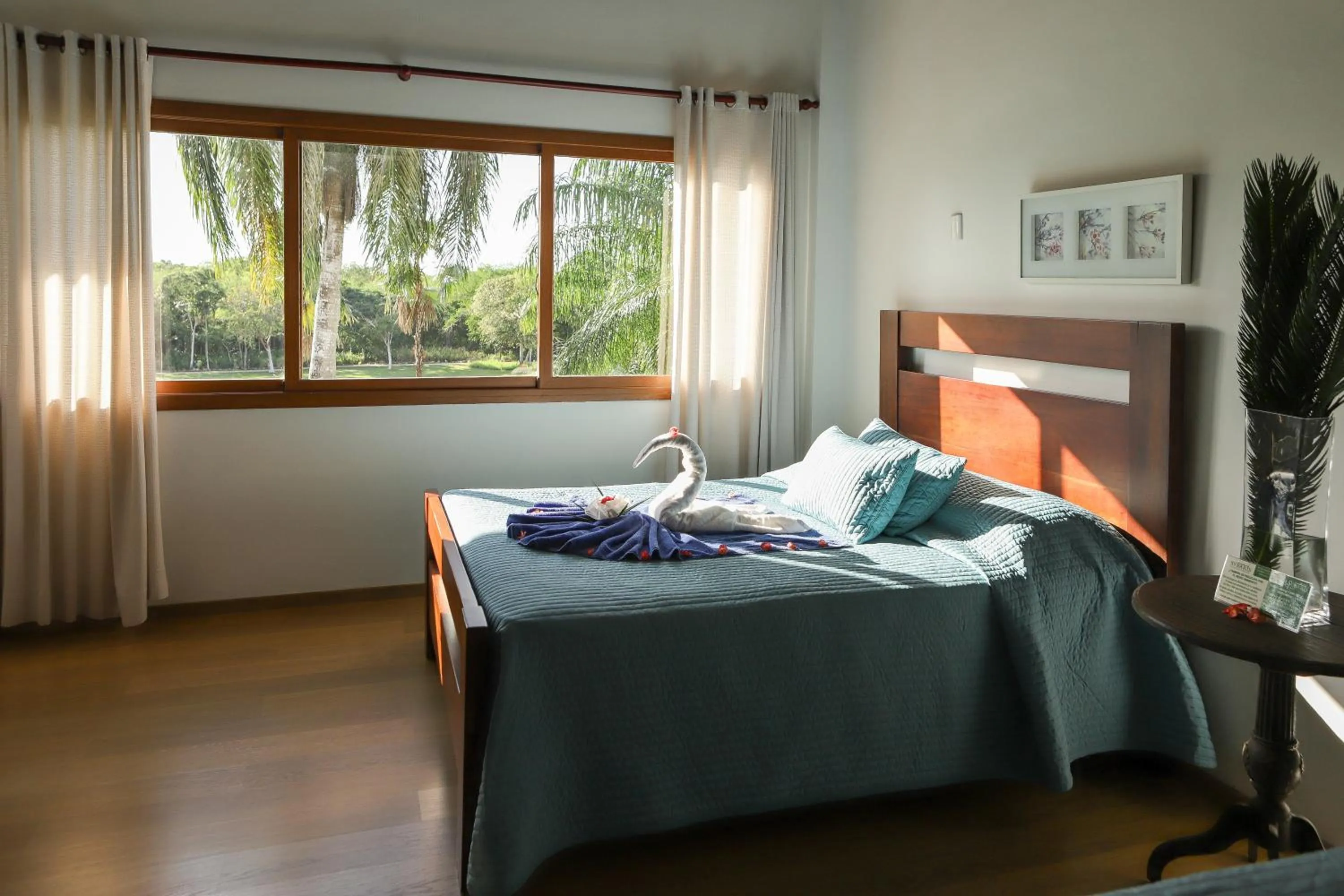 Bed in Sybaris Suites & Residences