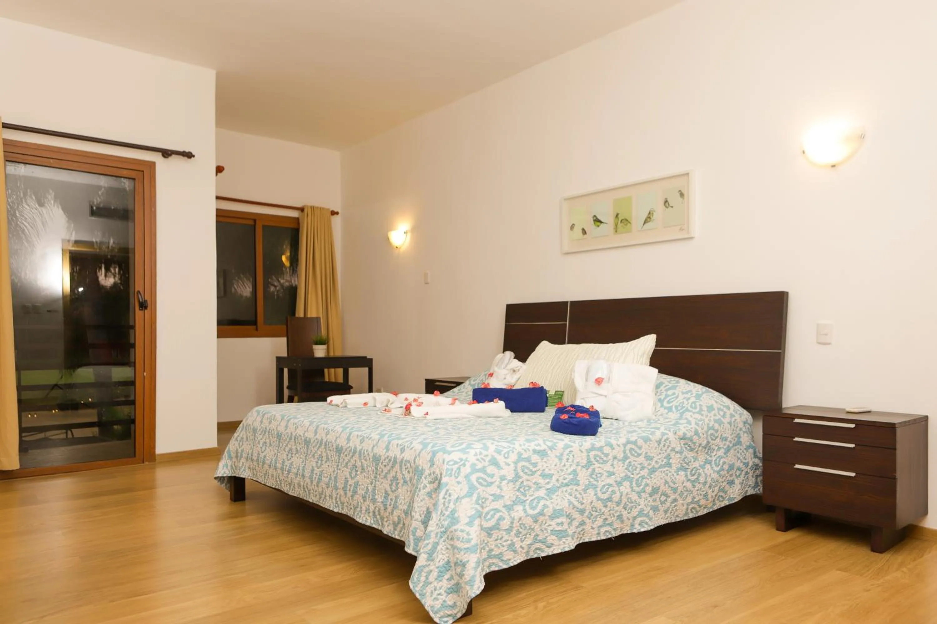 Bed in Sybaris Suites & Residences