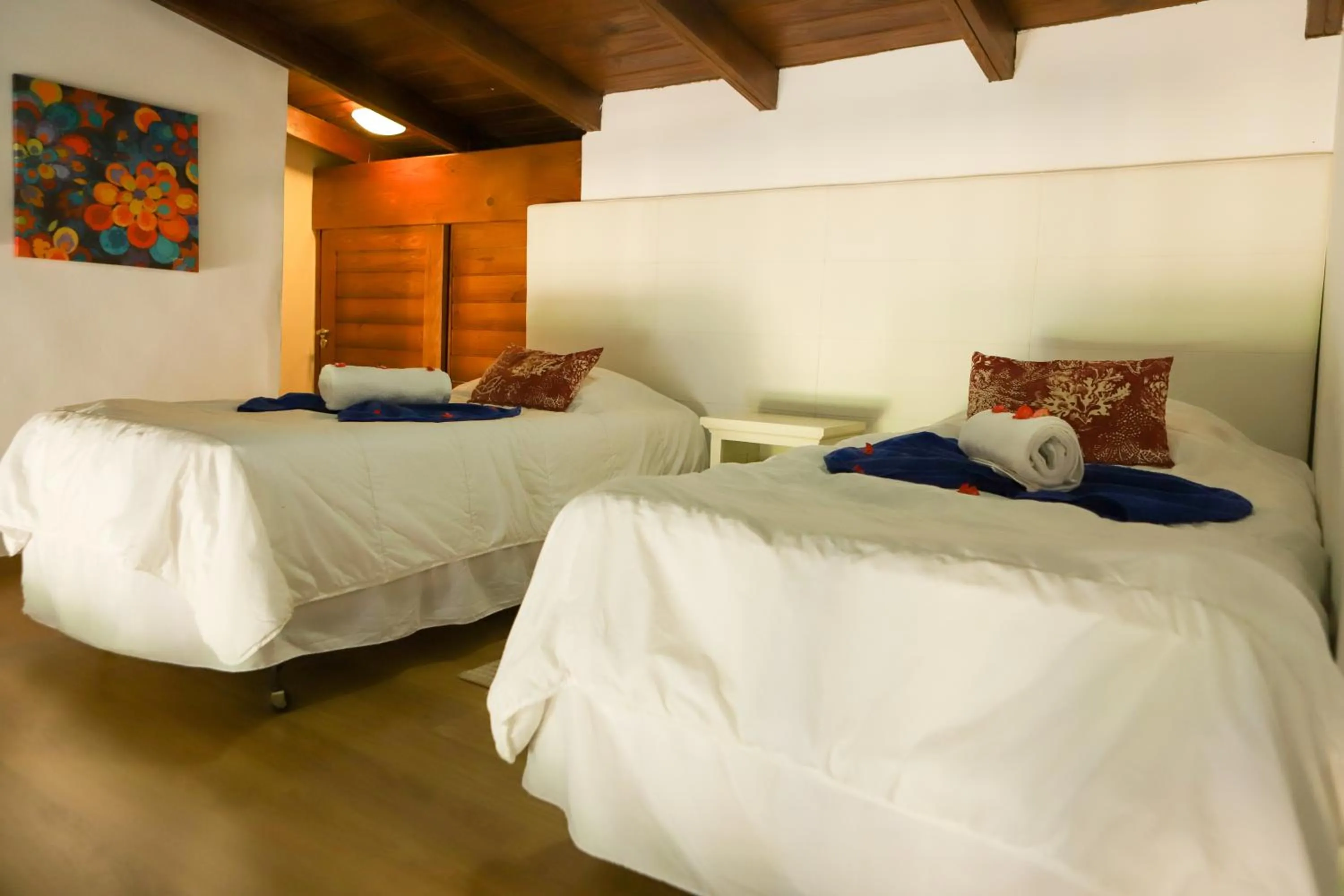 Bed in Sybaris Suites & Residences
