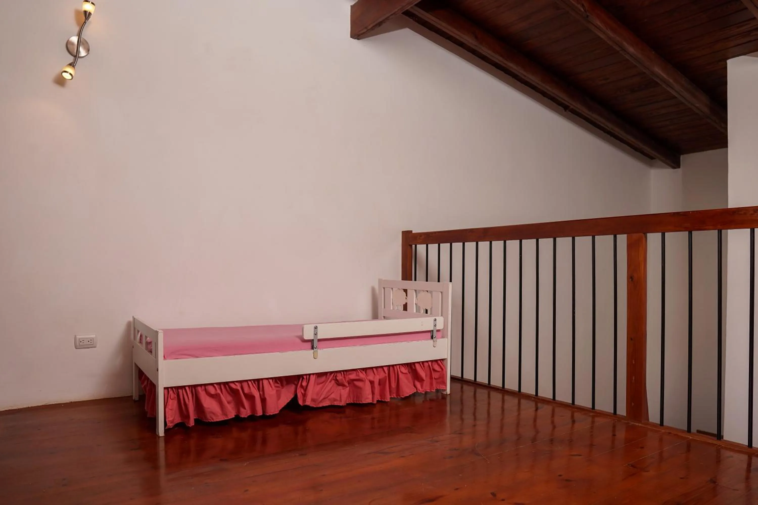 Bed in Sybaris Suites & Residences