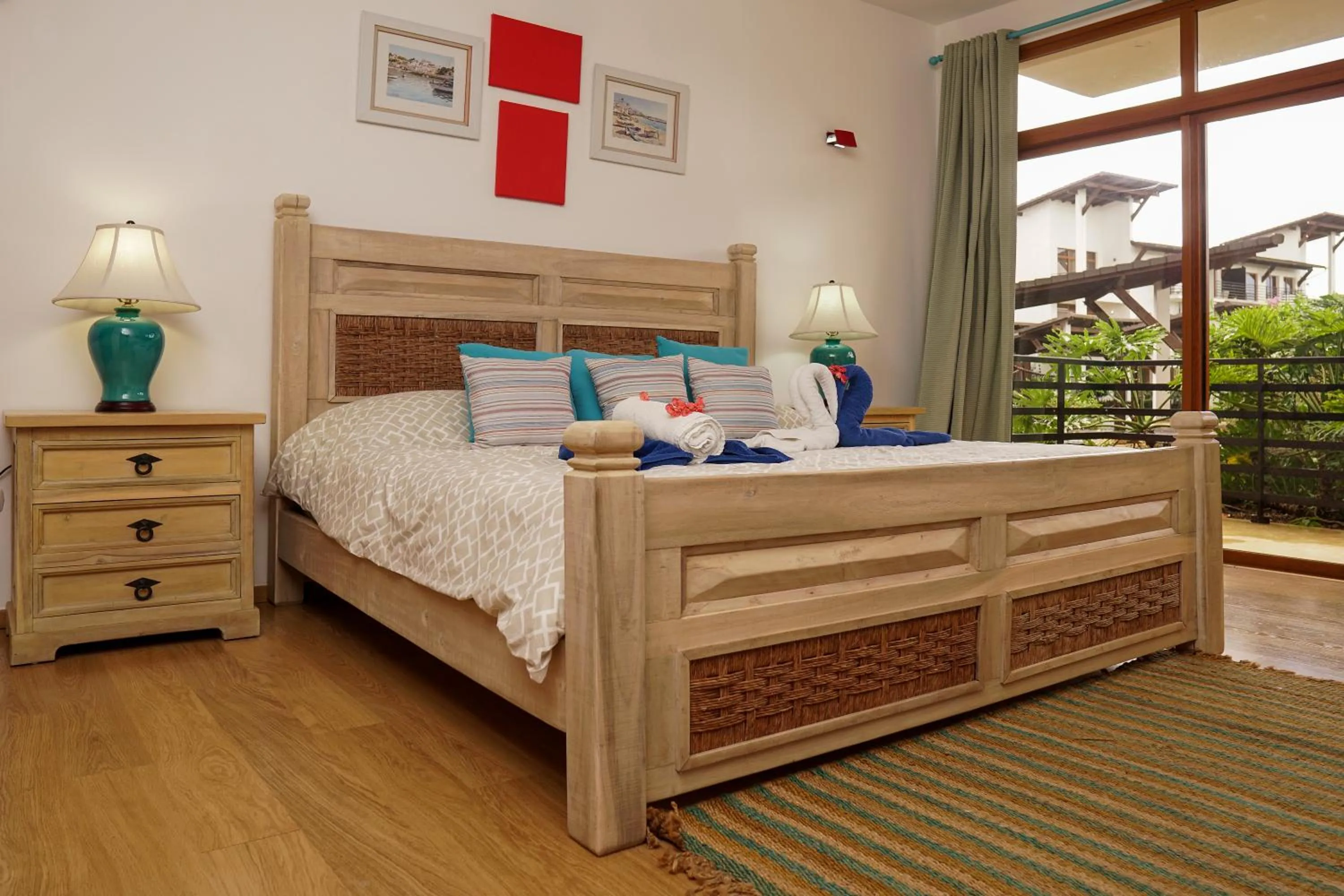 Bed in Sybaris Suites & Residences