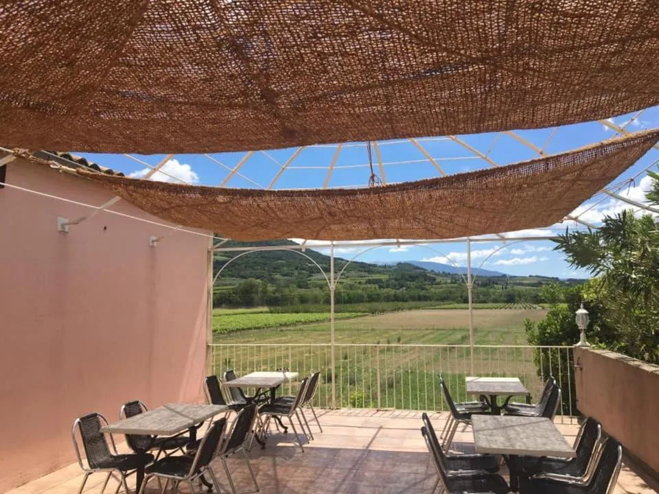 Patio in Logis Hôtel La Bastide des Monges