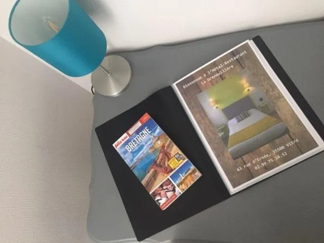 Bedroom in Hotel Restaurant La Grenouillère