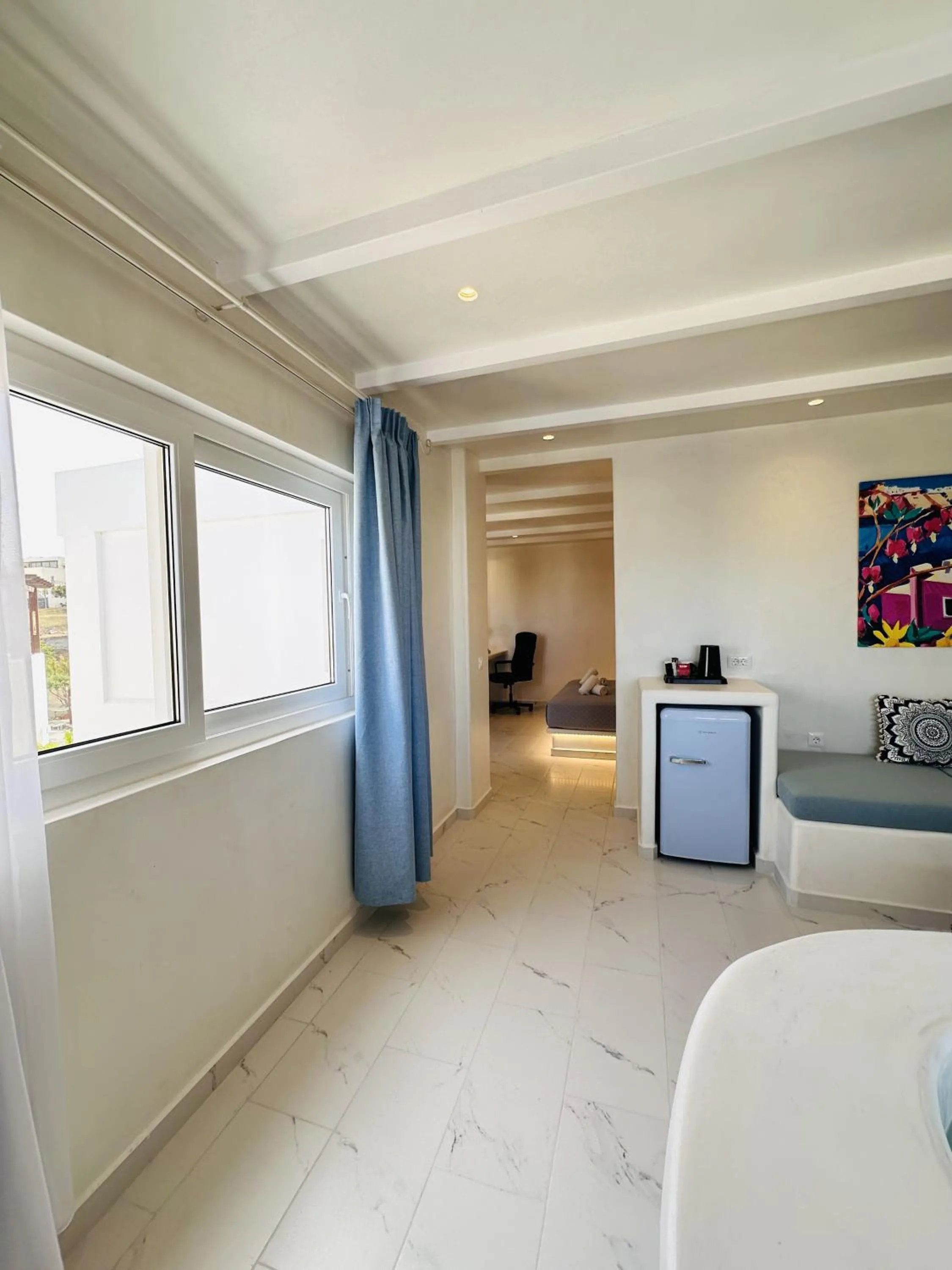 Bed in Arlene Suites