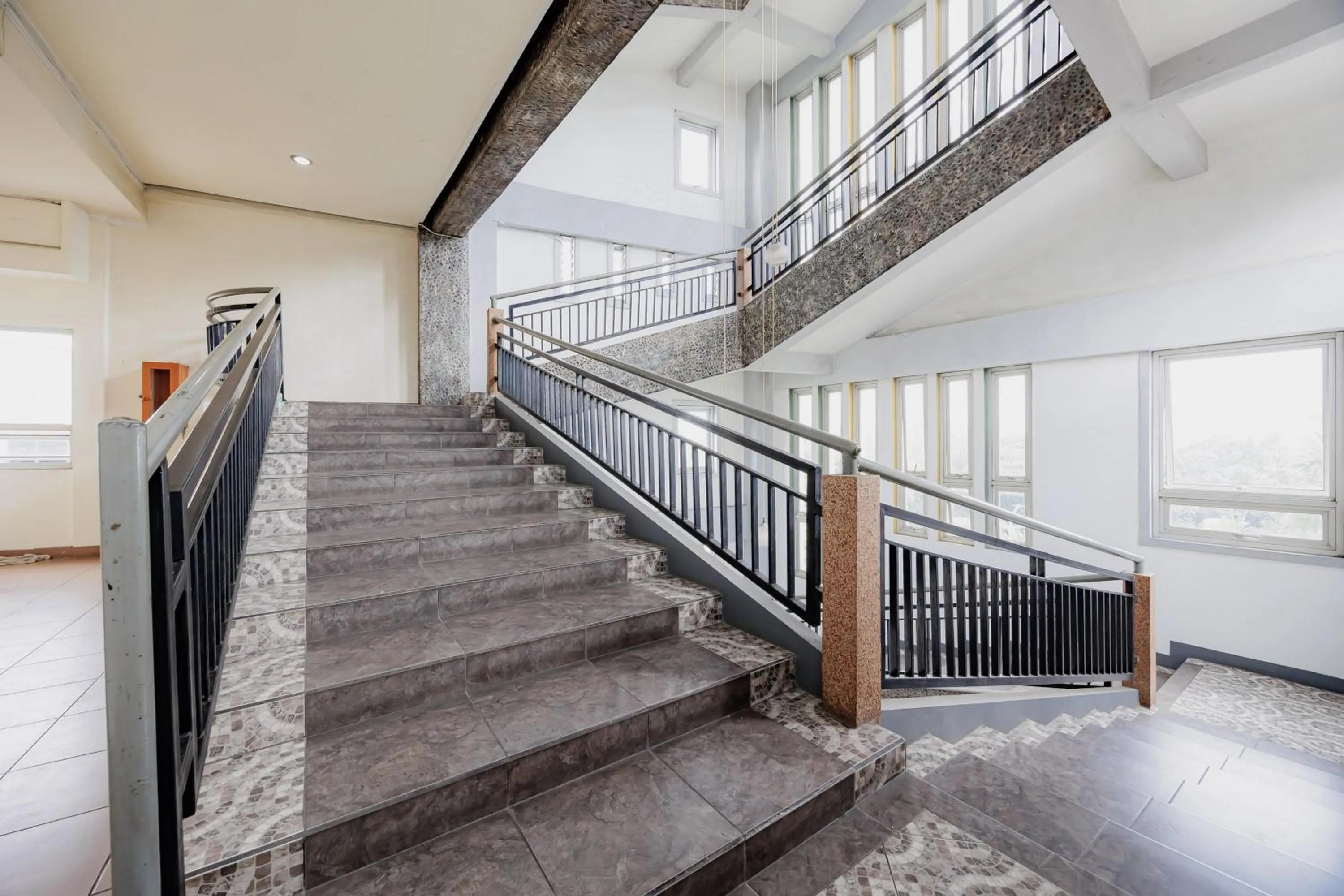 Property building in RedDoorz Plus at Amalio Hotel Surapati