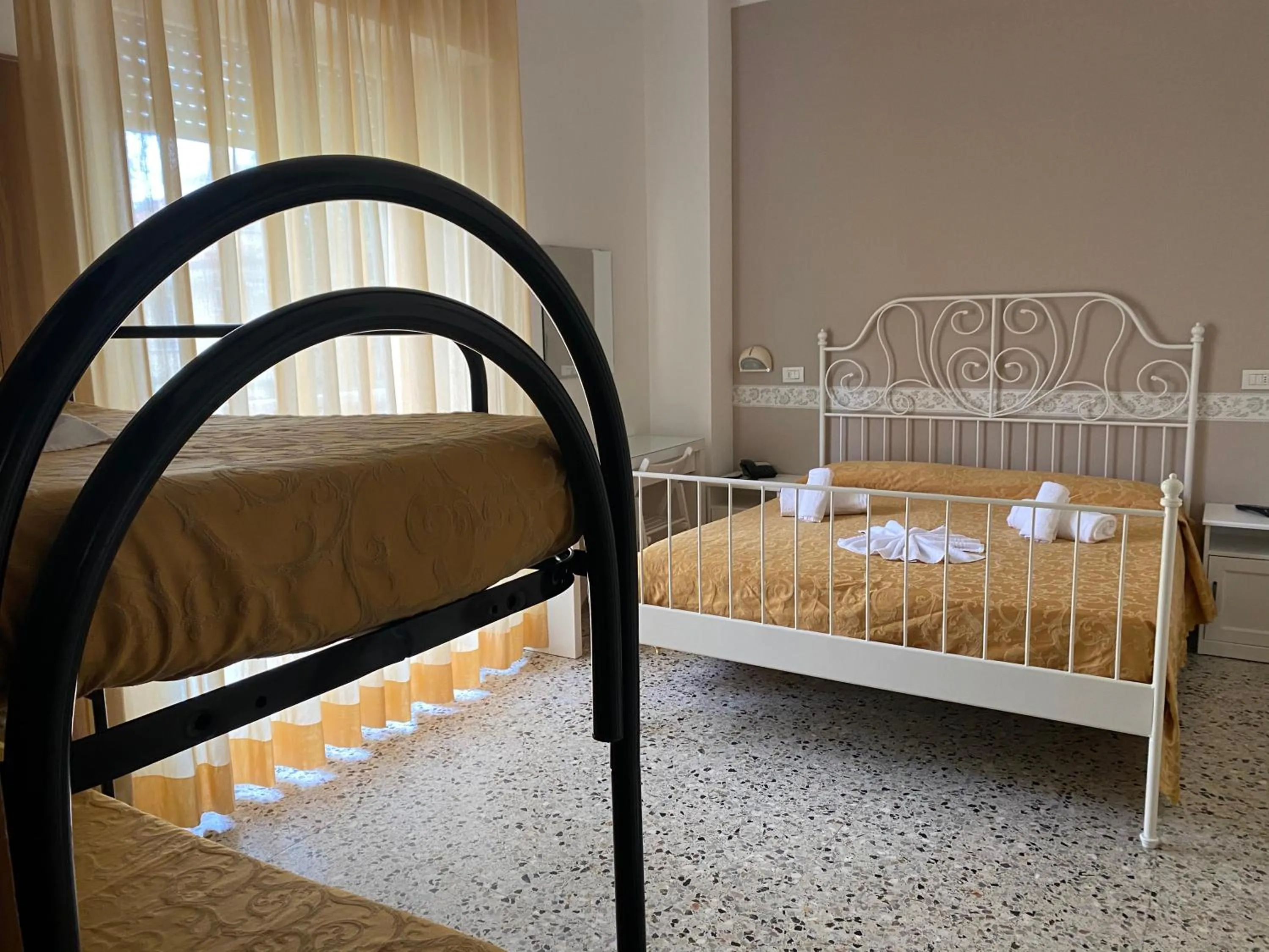 Bed in Hotel Modenese