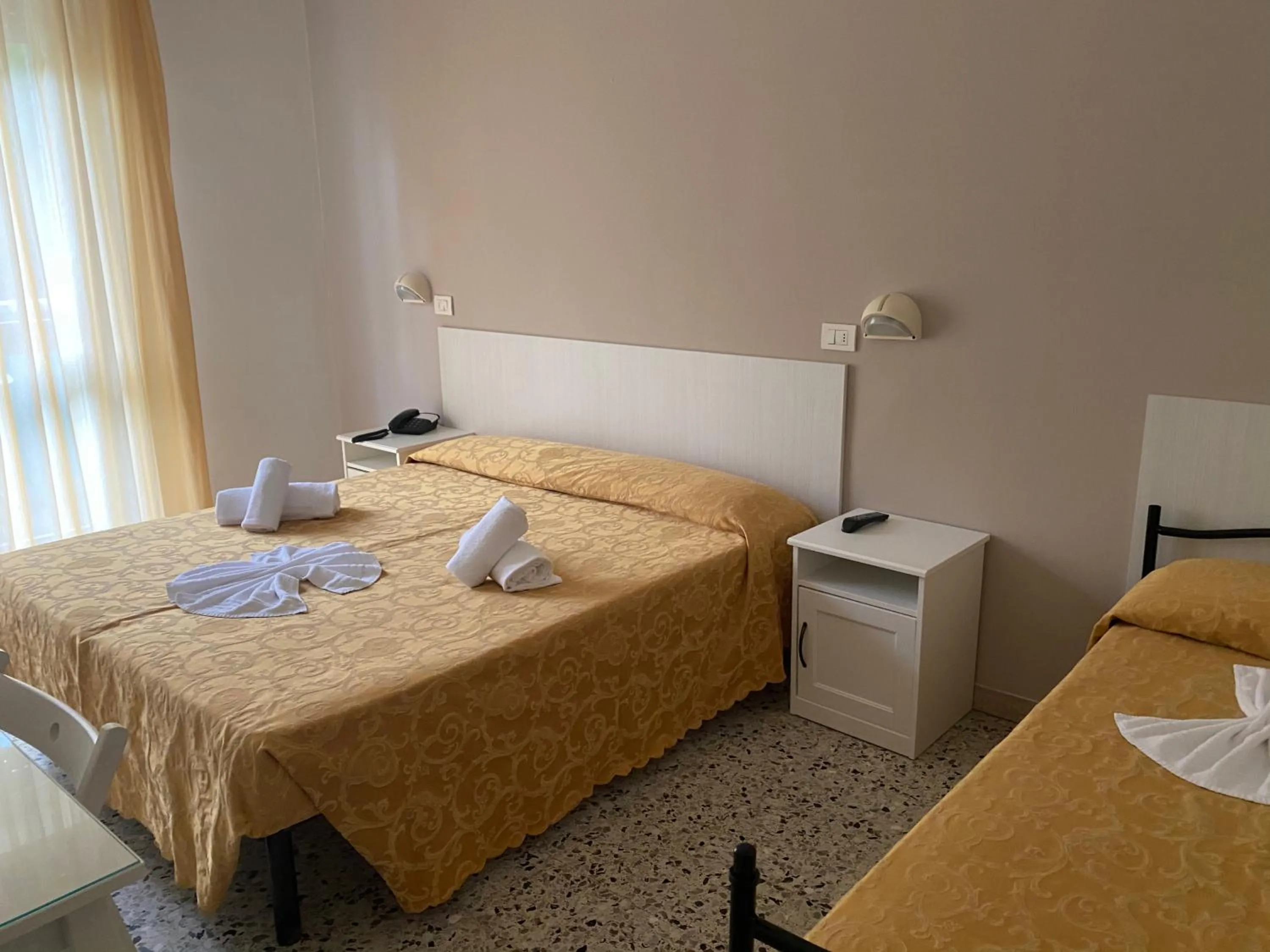 Bed in Hotel Modenese