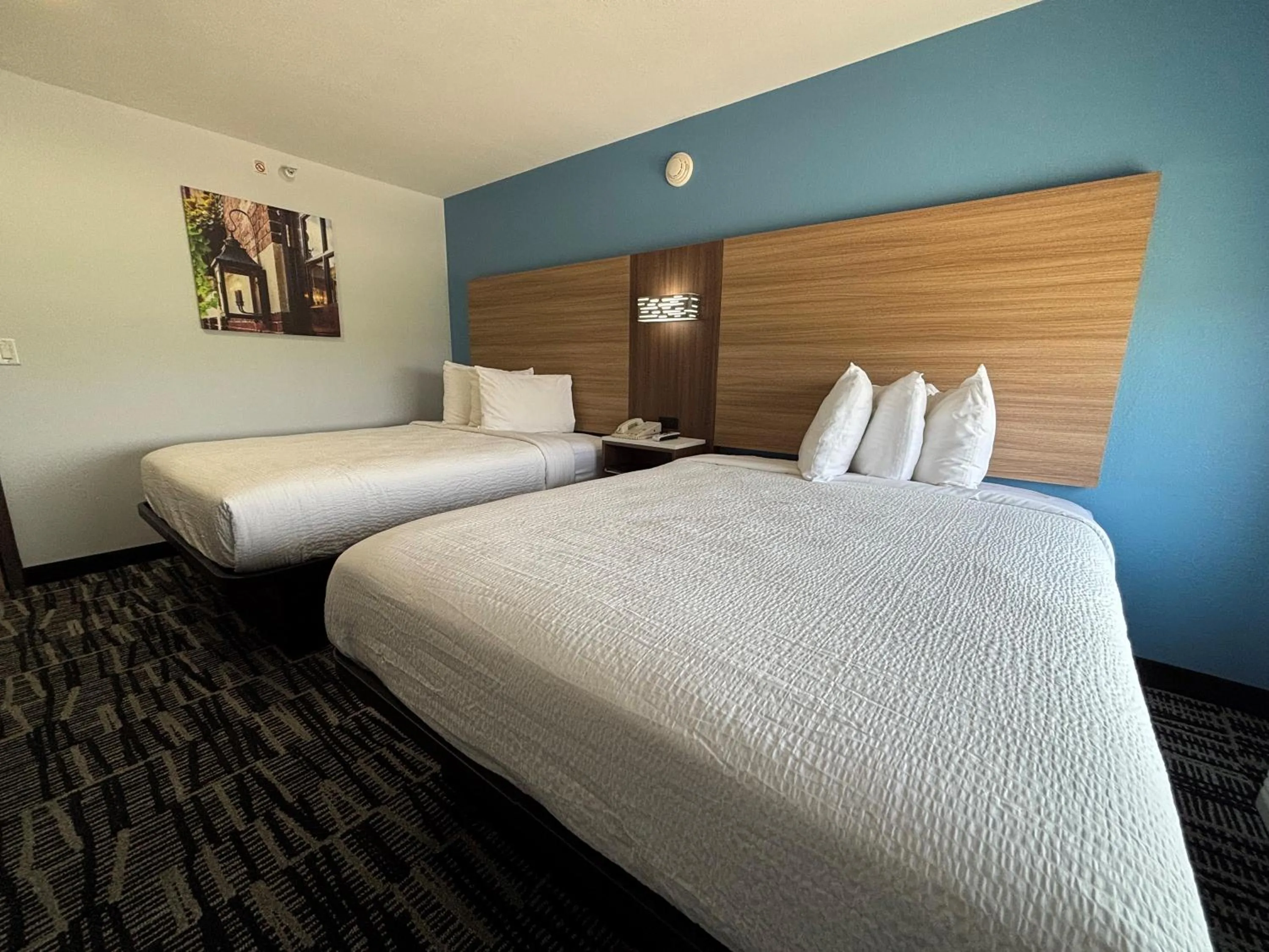 Bed in Baymont by Wyndham Jacksonville