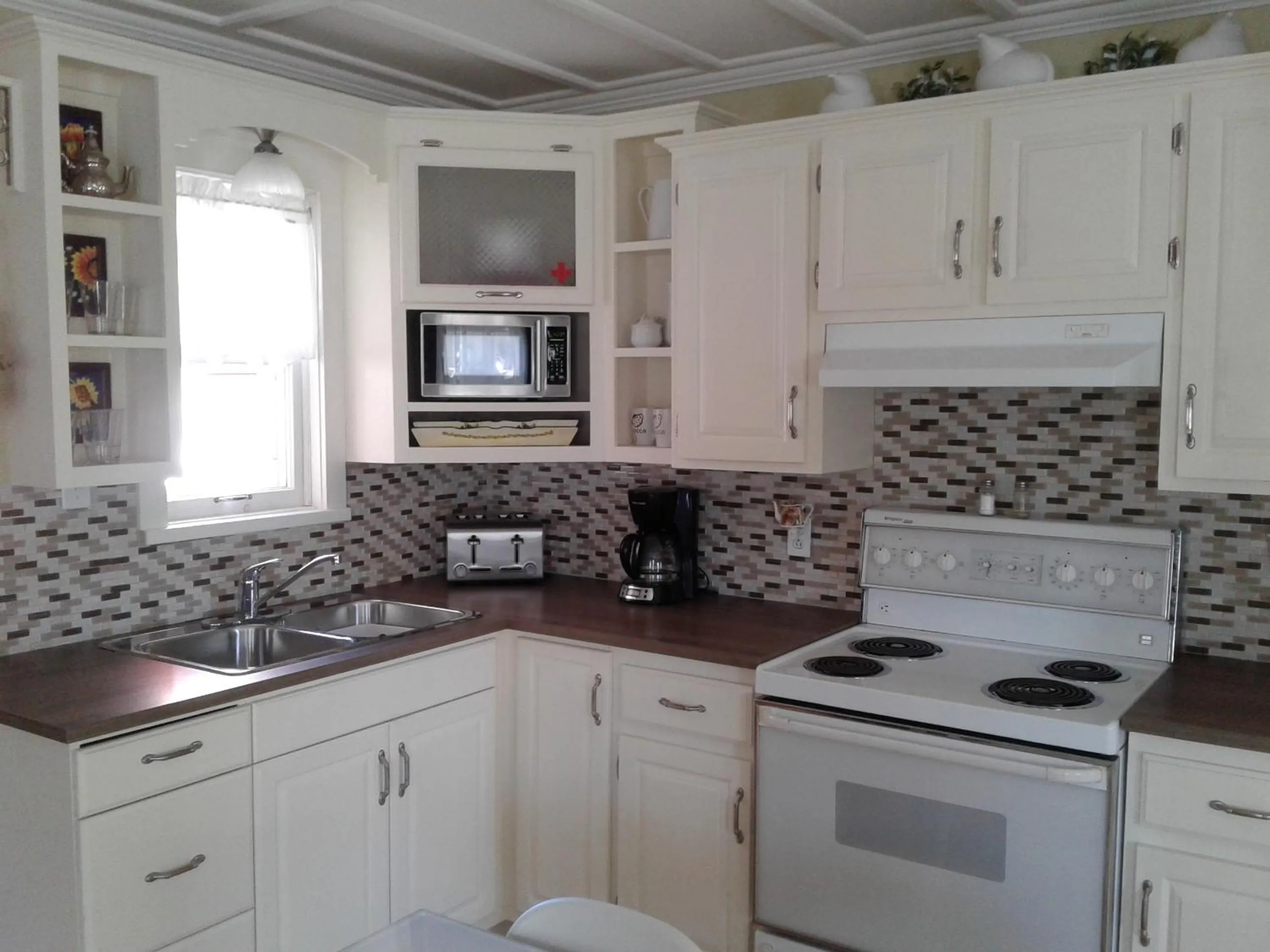 Communal kitchen in Le Gîte Du Coteau