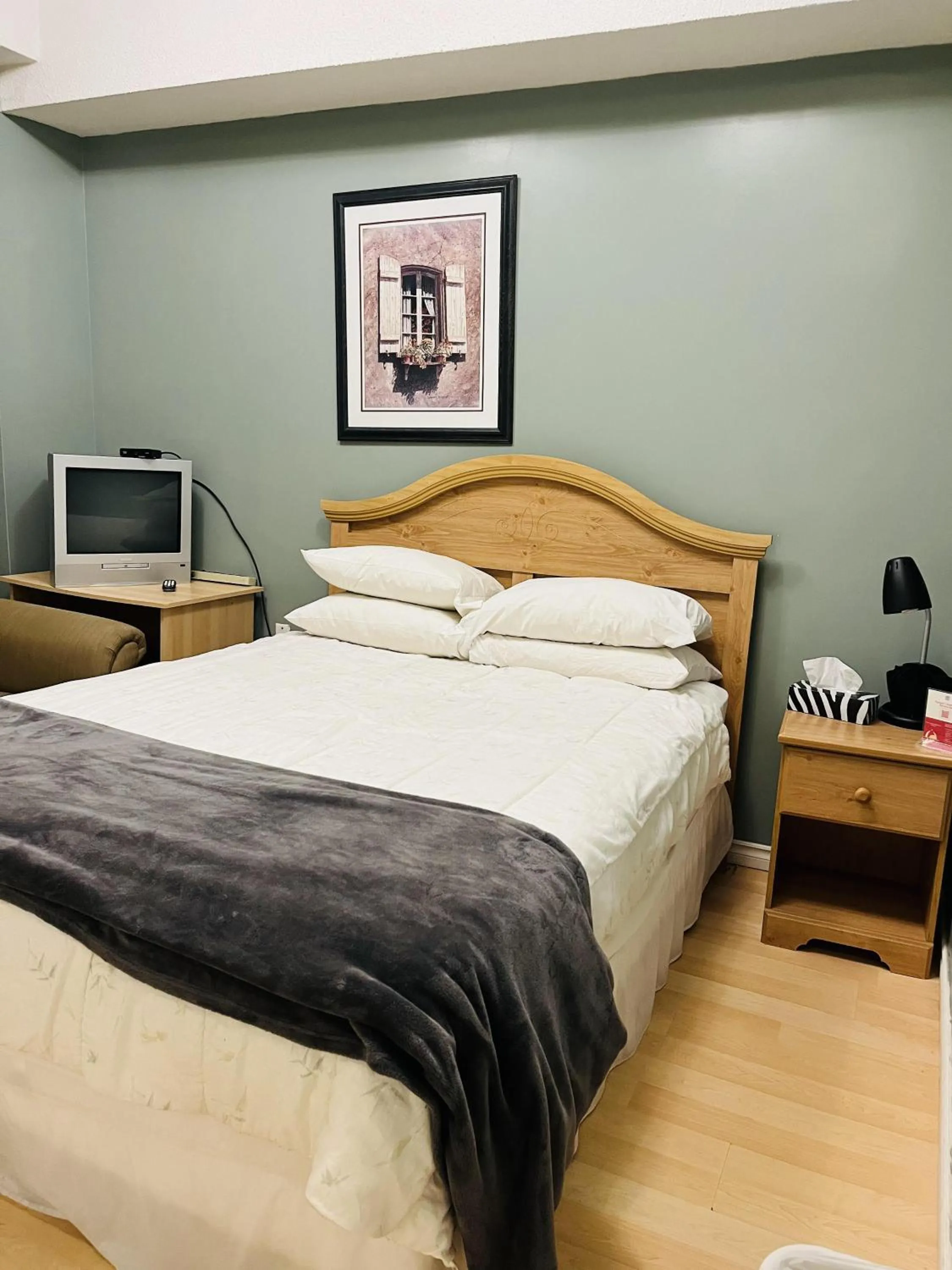 Bed in Saint Lawrence Residences and Suites