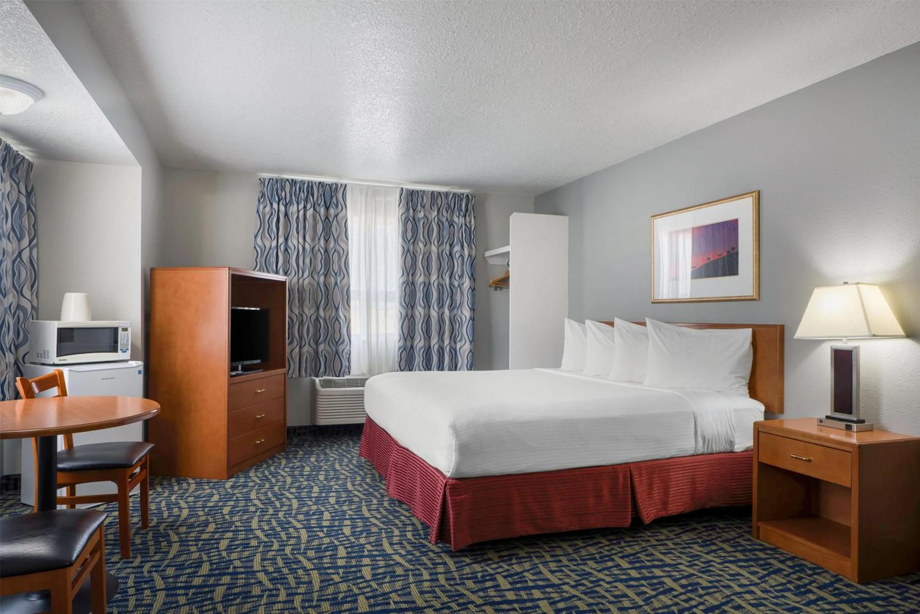 Bedroom, Bed in SureStay Plus Hotel by Best Western Lethbridge