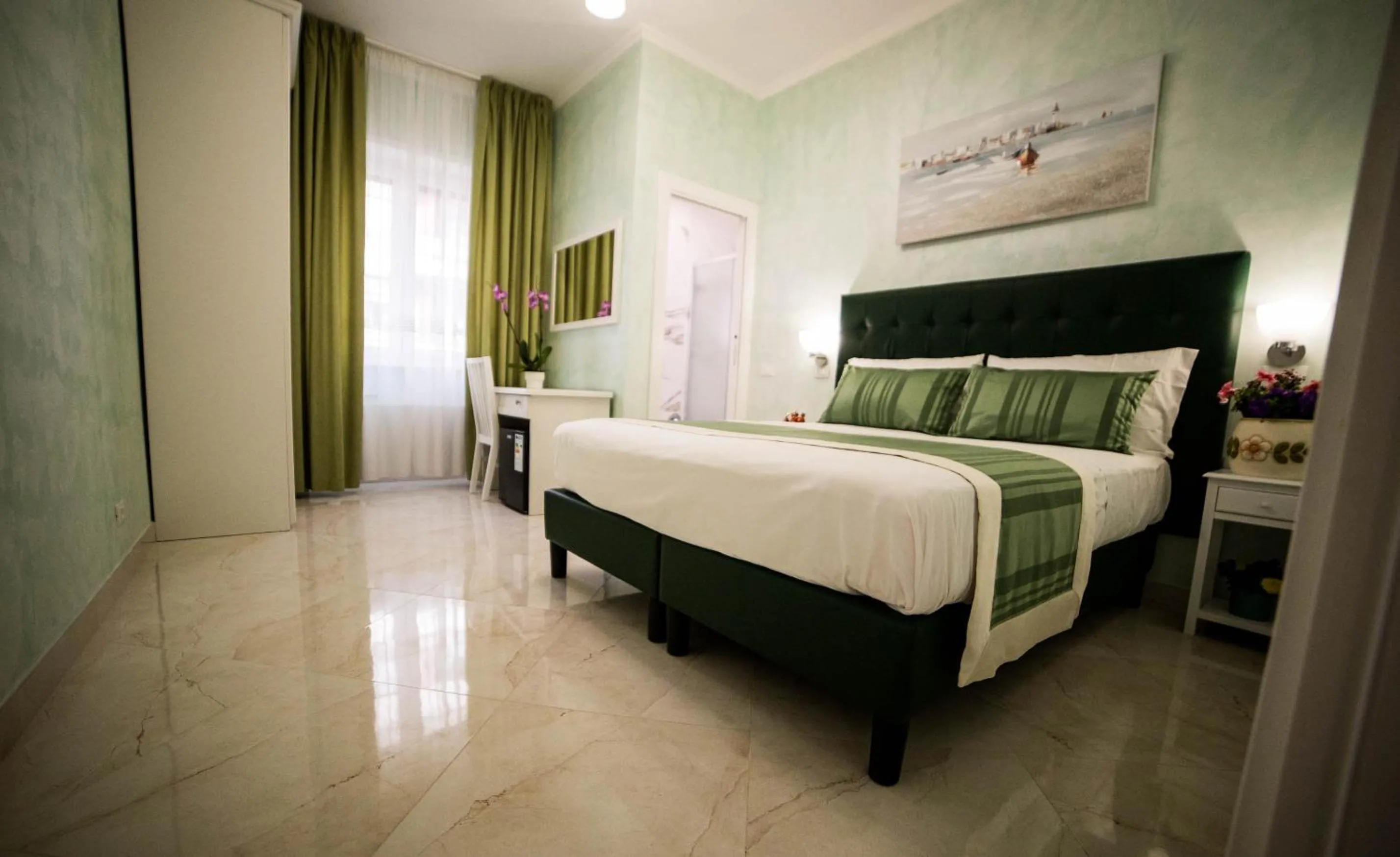 Bed in St. Peter Area Luxury Suites
