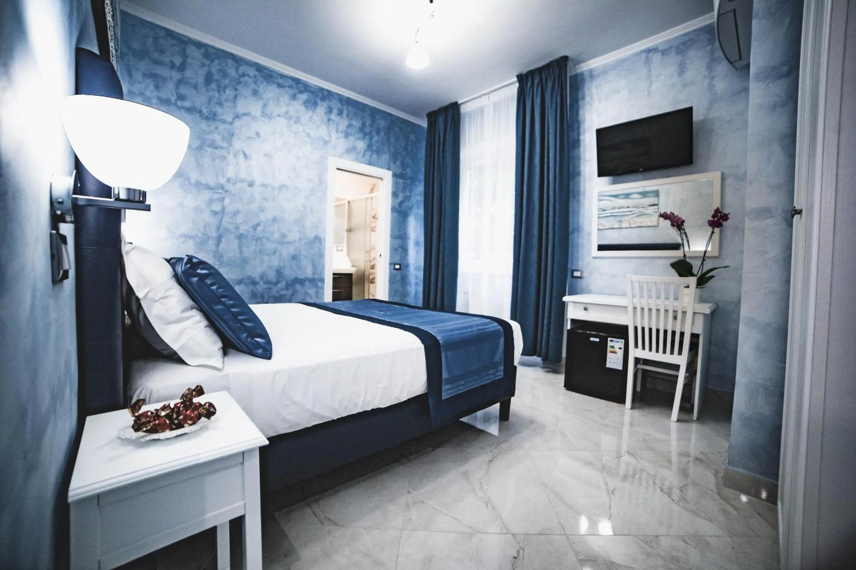Bed in St. Peter Area Luxury Suites