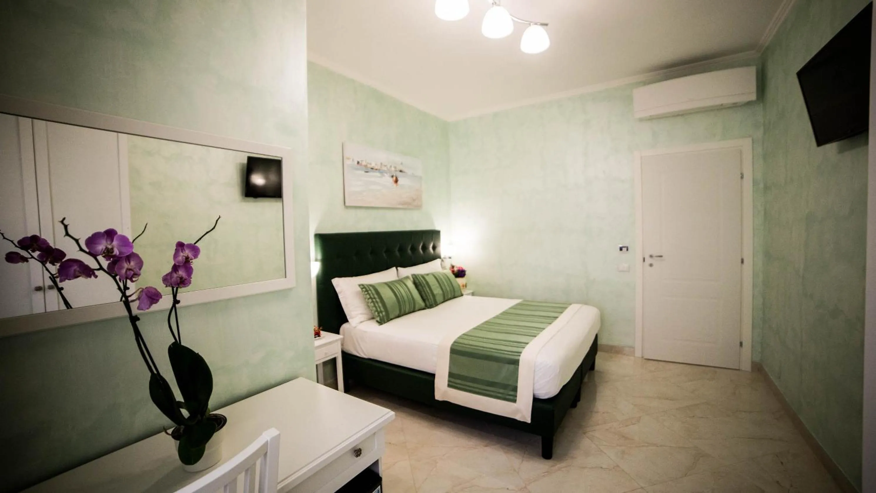 Bed in St. Peter Area Luxury Suites