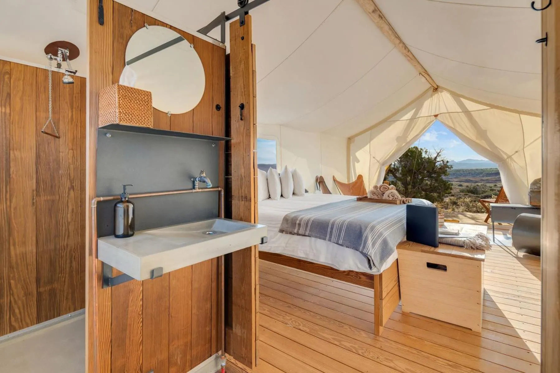 Photo of the whole room, Bed in Under Canvas Moab