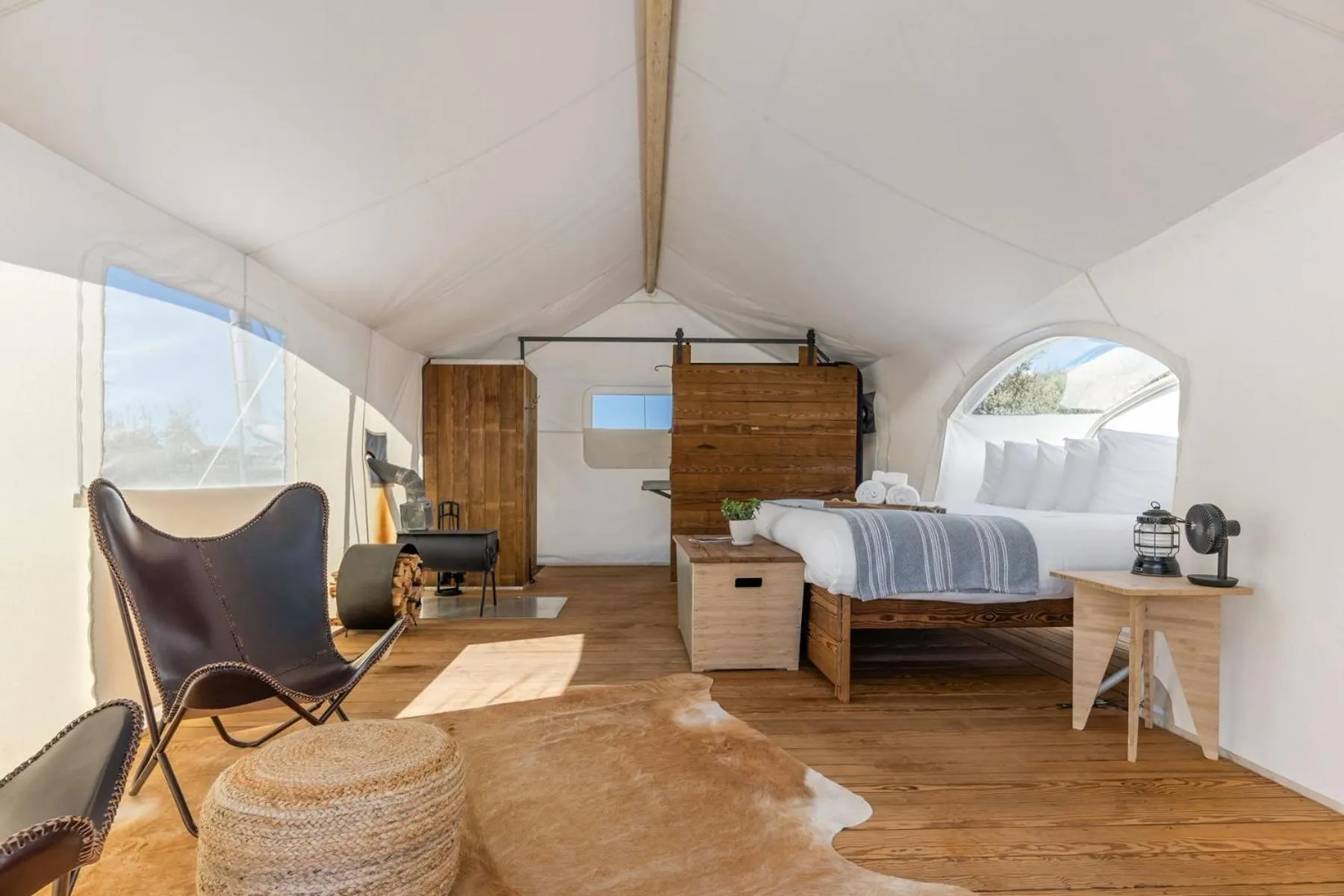 Photo of the whole room, Bed in Under Canvas Moab