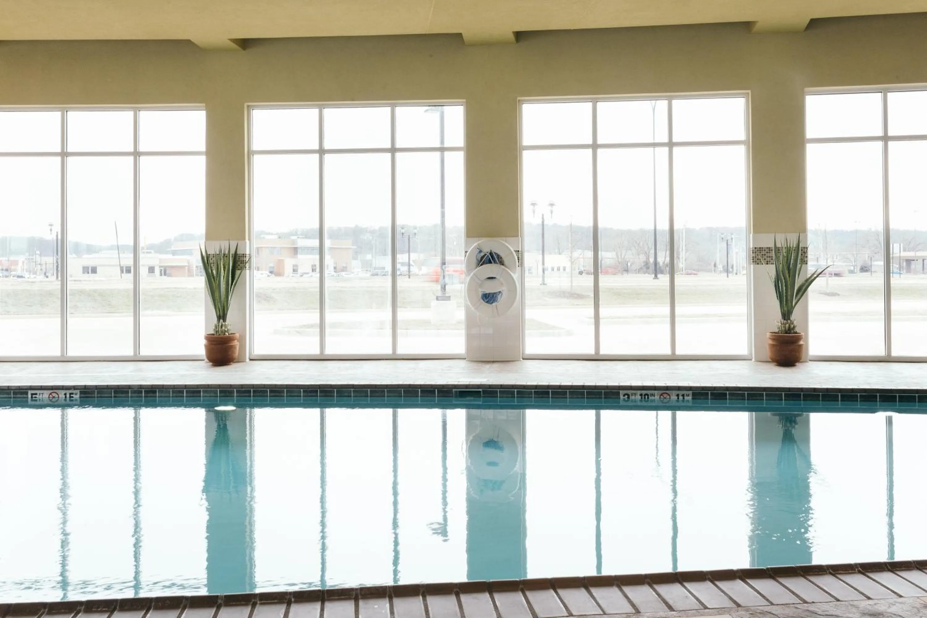 Swimming pool in Holiday Inn and Suites East Peoria by IHG