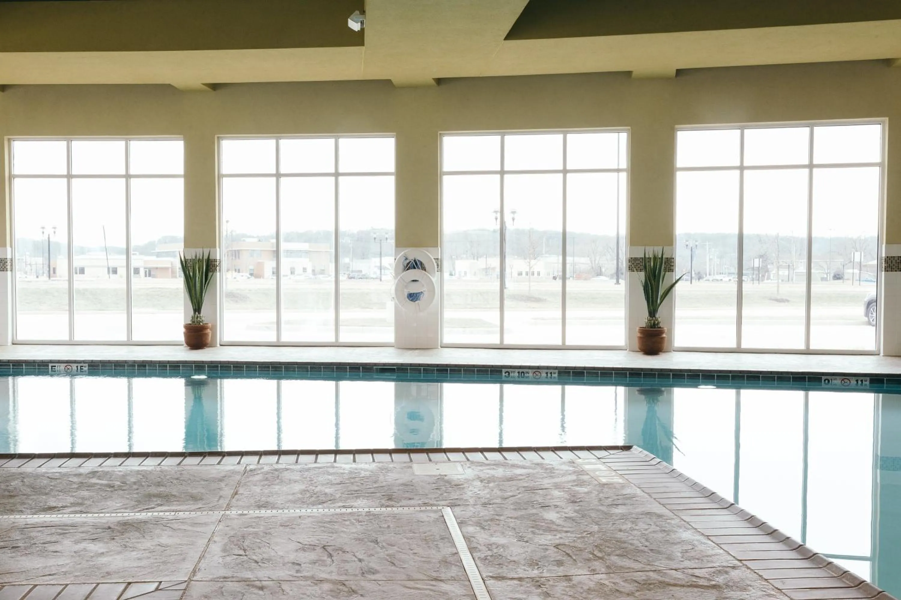 Swimming pool in Holiday Inn and Suites East Peoria by IHG